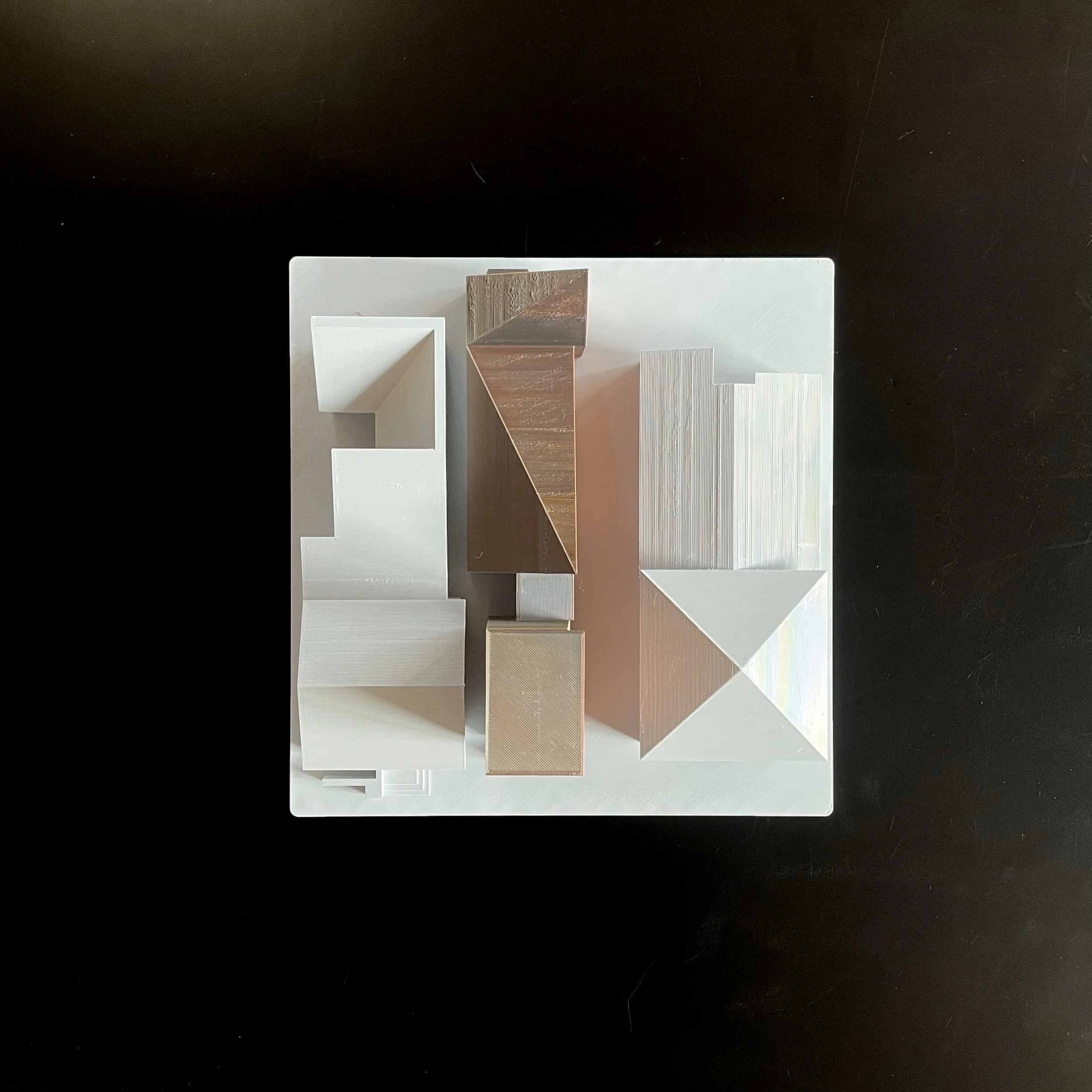 Architectural massing model viewed from above.