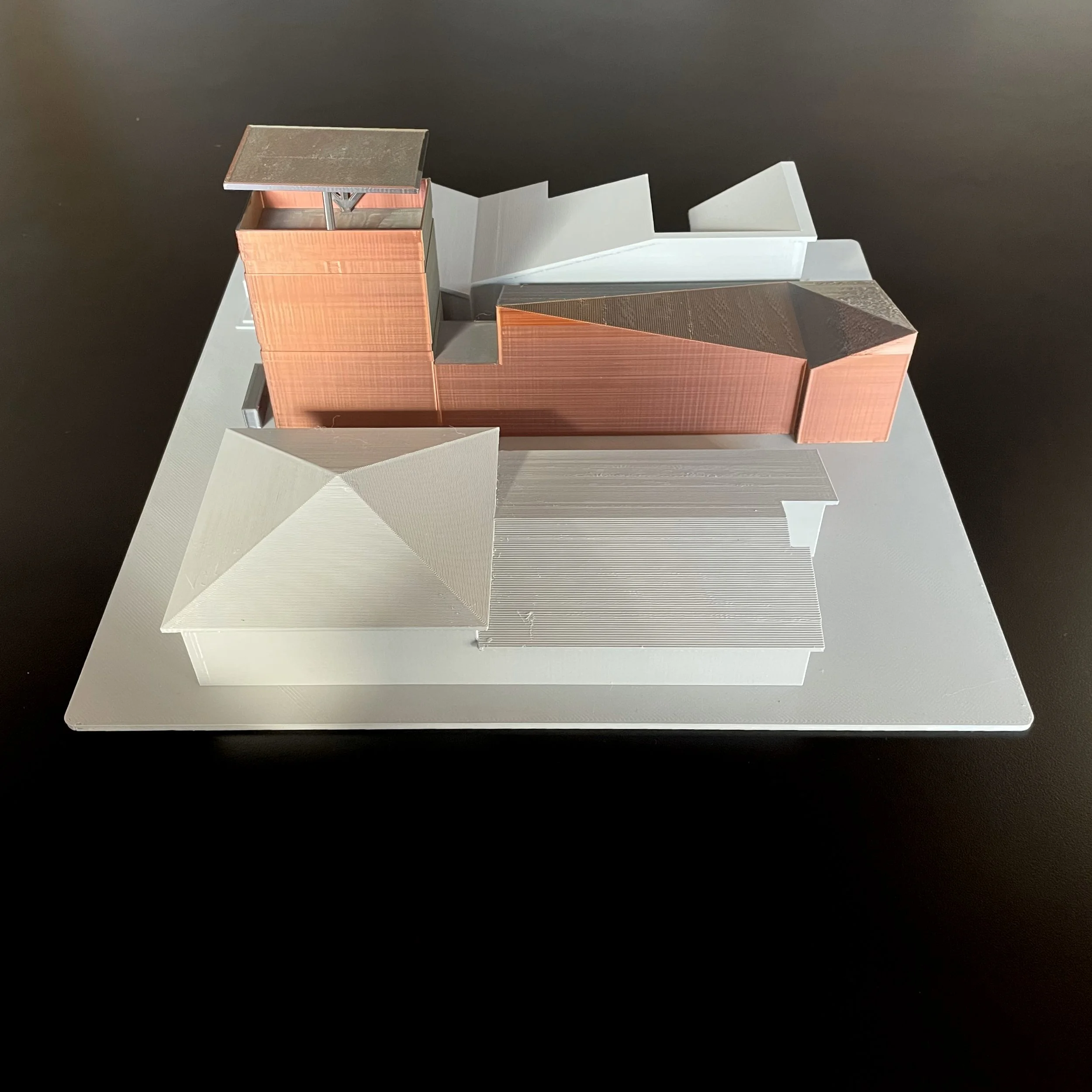 Architectural massing model viewed from an elevated front angle