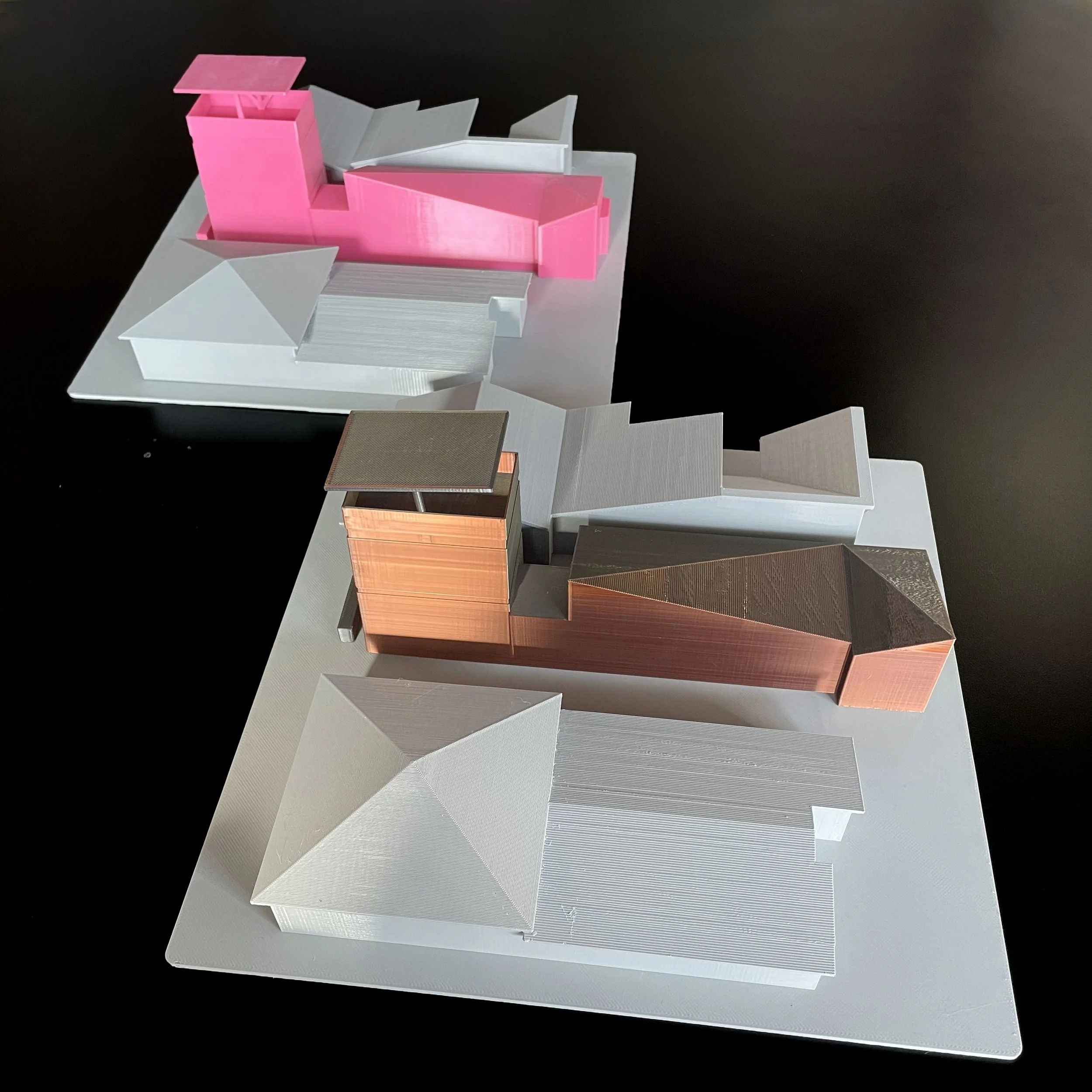 Architectural massing models viewed from the side