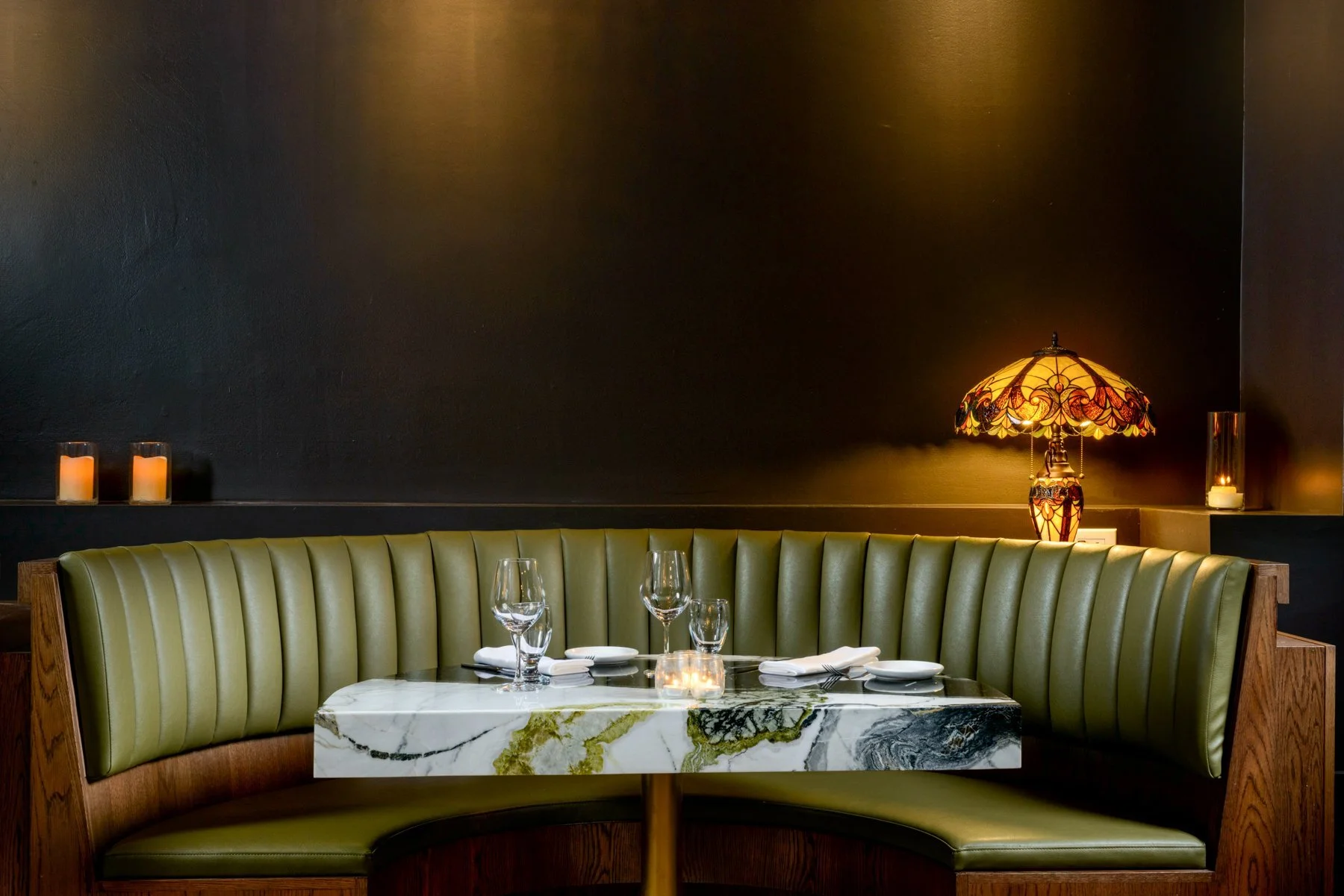 Curved banquette seating in Rapscallion Restaurant