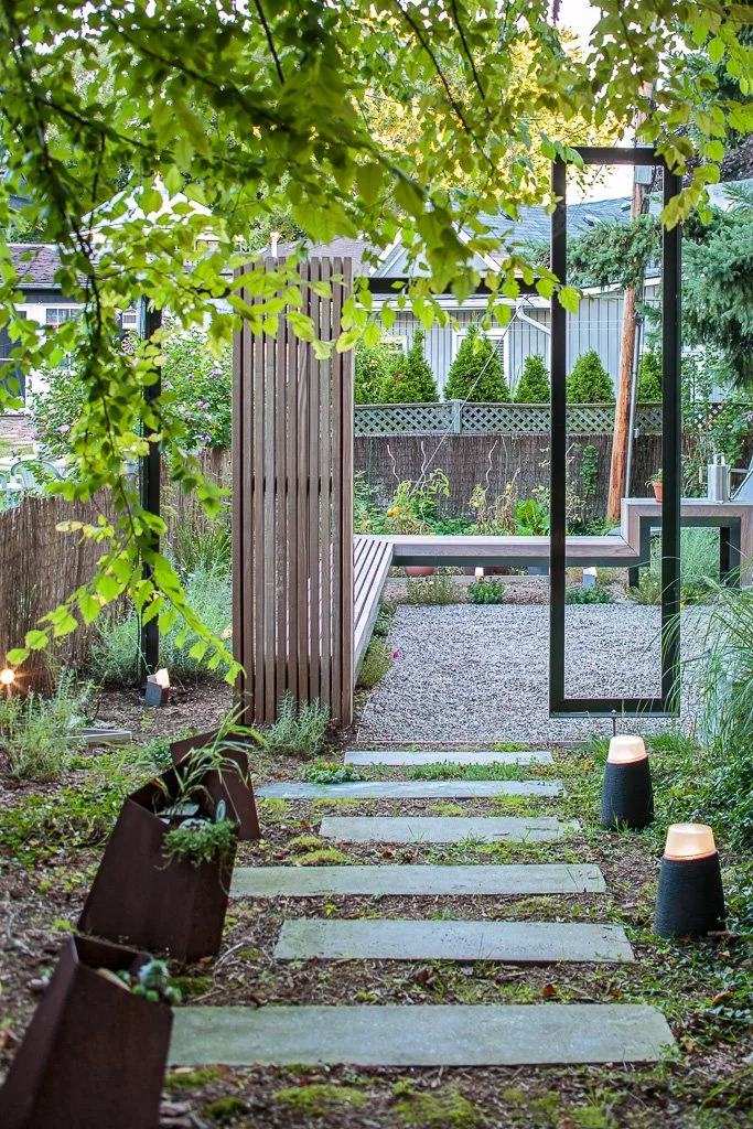 Path with stone pavers leading to a garden entrance