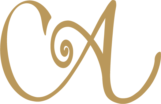 A stylized letter A in elegant, brown calligraphy.