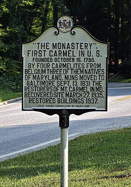 Historical marker about the first Carmelite monastery in the U.S., located in Maryland, detailing its history from 1790 to 1937.
