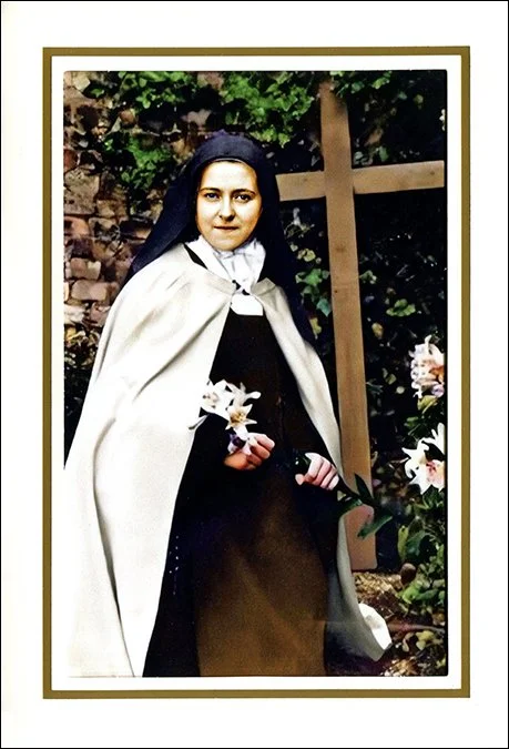 St. Thérèse kneeling in the garden with a lily Note Card