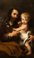 A painting of a man with a beard holding a young child on his lap.