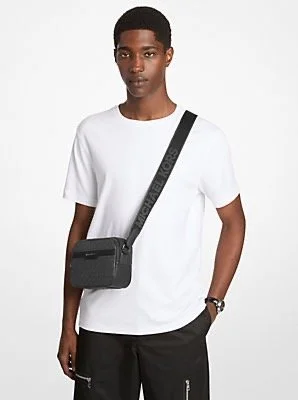 Young man wearing a white T-shirt, black pants, and a watch, carrying a black crossbody bag with a strap.