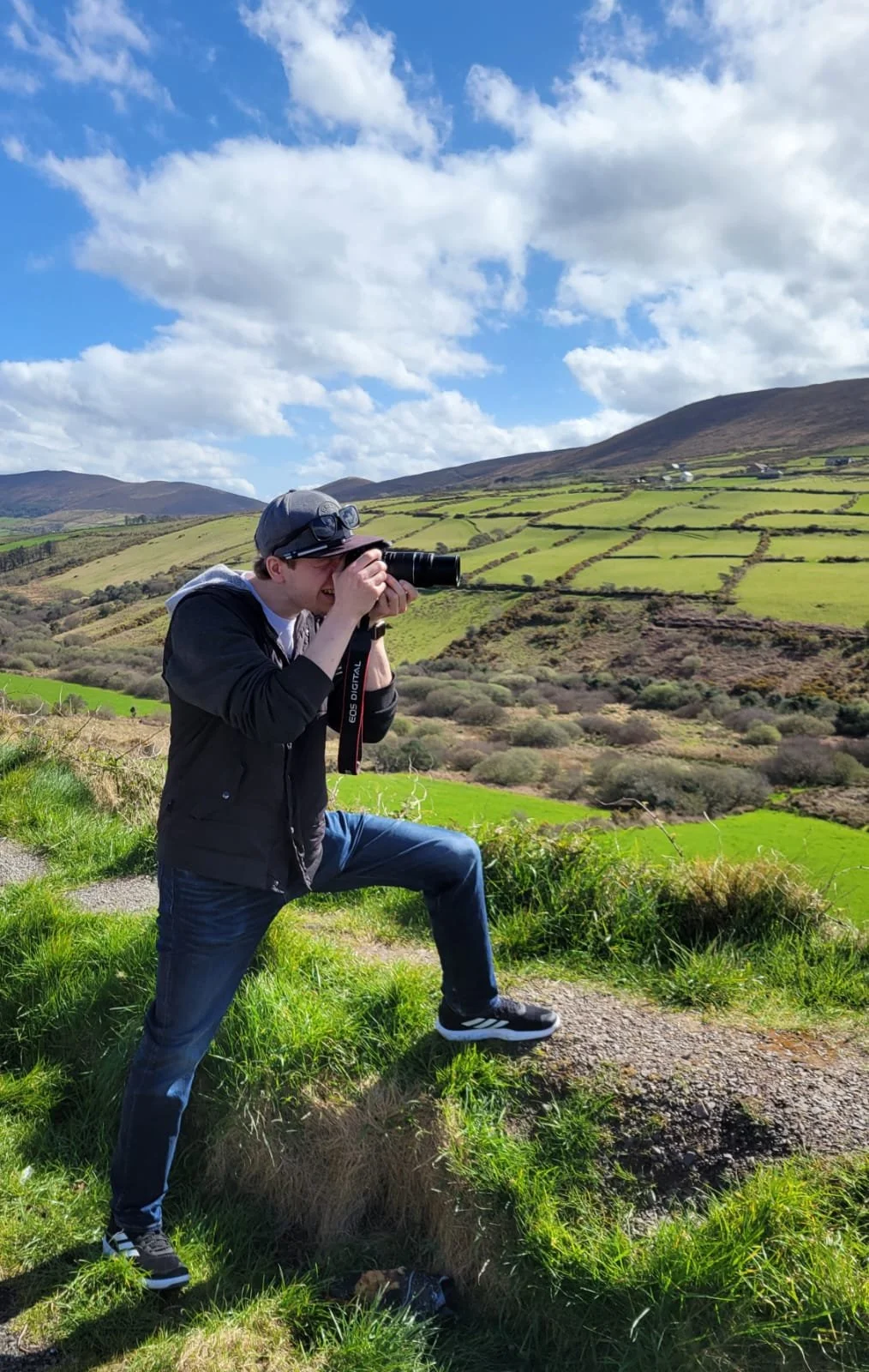 Cullan fails to photograph the beautiful rolling Irish hills behind him