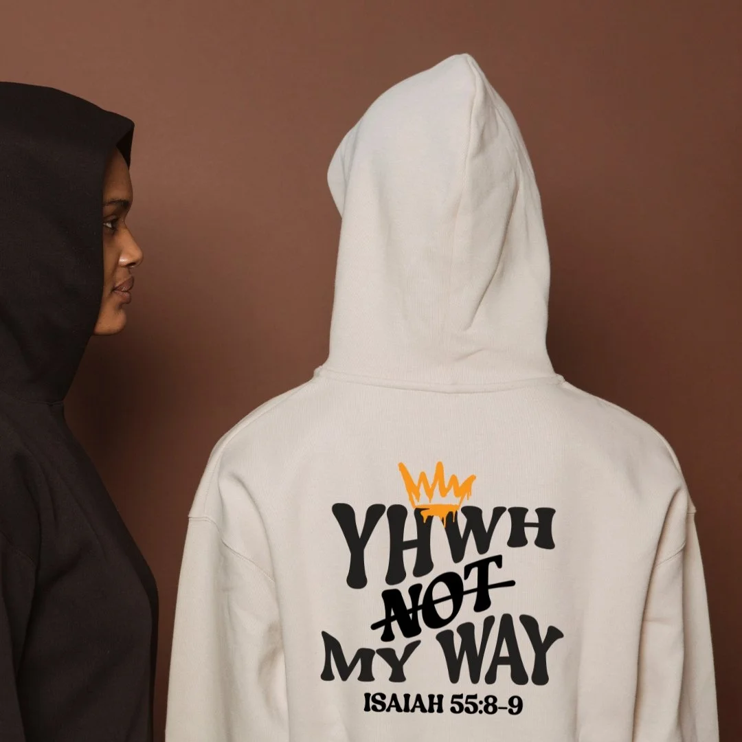 Person facing a person wearing a white hoodie with the text "WHY NOT MY WAY" and a crown illustration, referencing Isaiah 55:8-9.