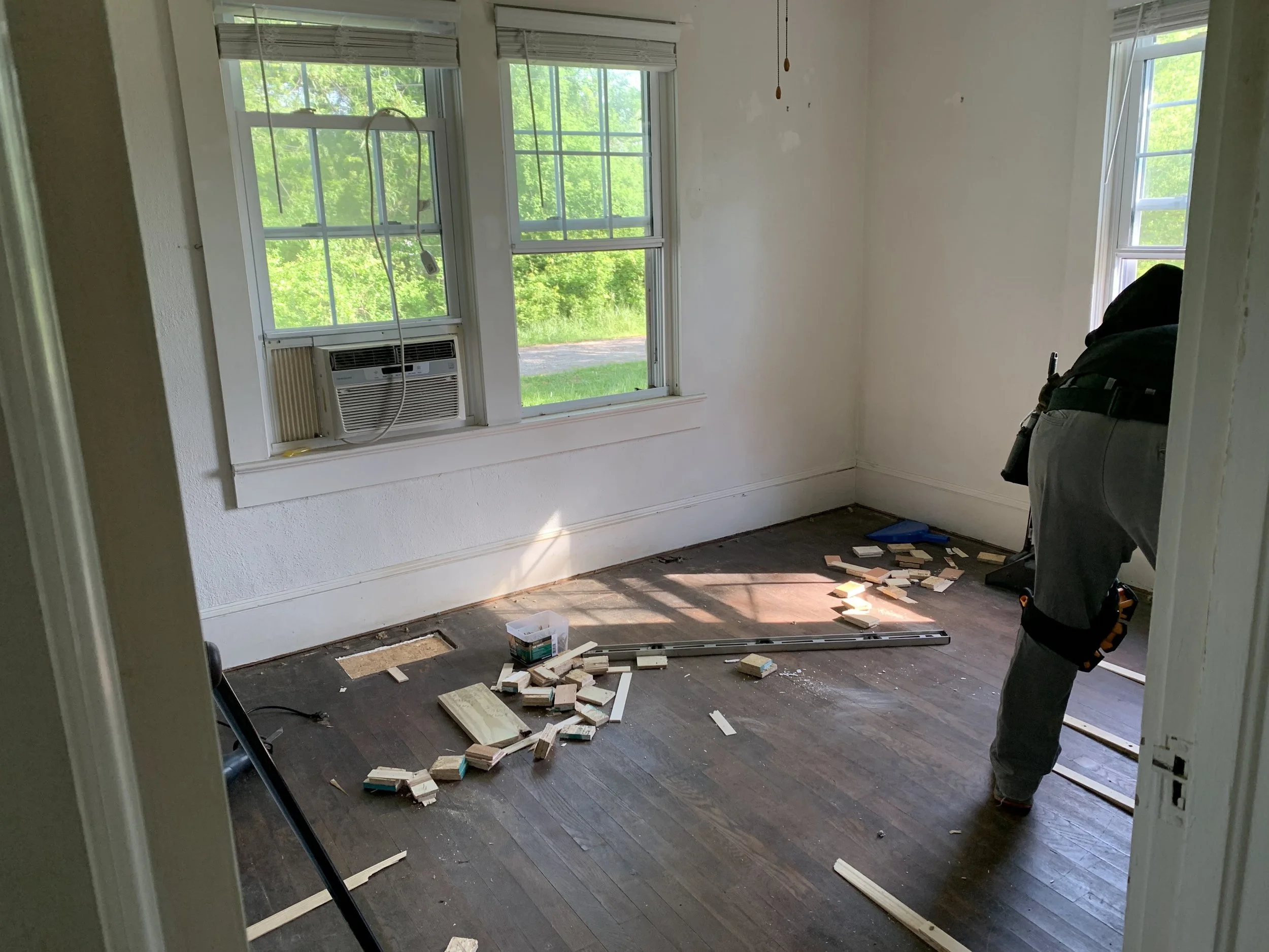 Flooring bedroom 2 before demo.jpeg