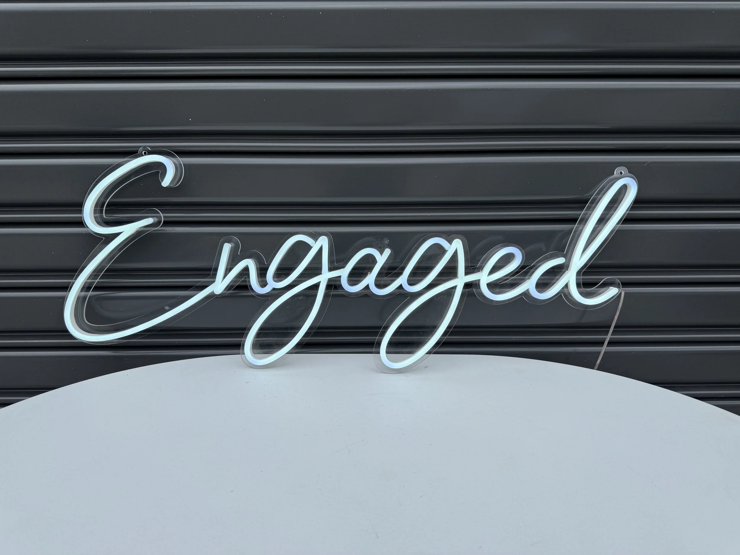 Neon_sign_Engaged_(lit_up) (1).jpg