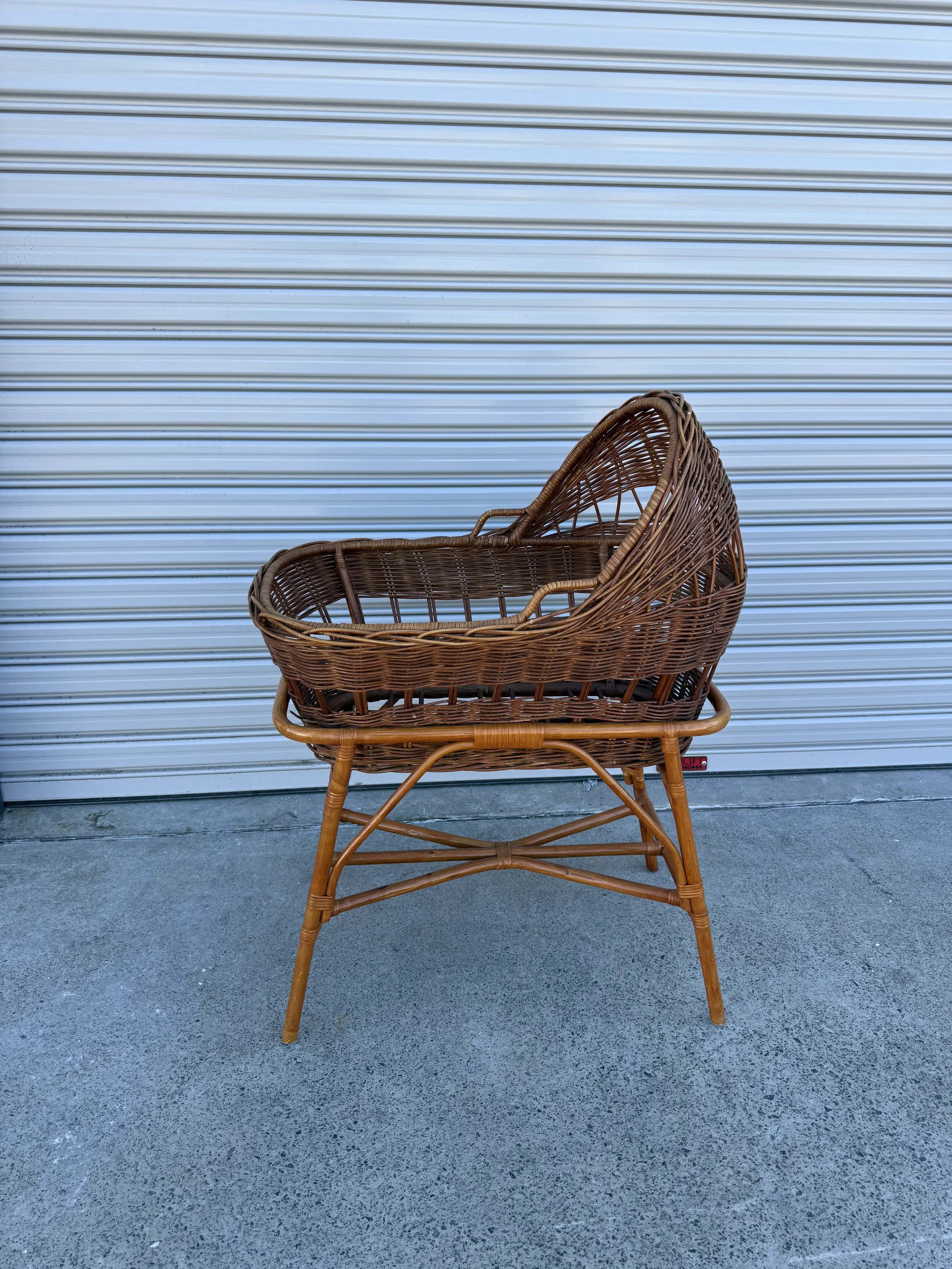 rattan baby bassinet.jpeg