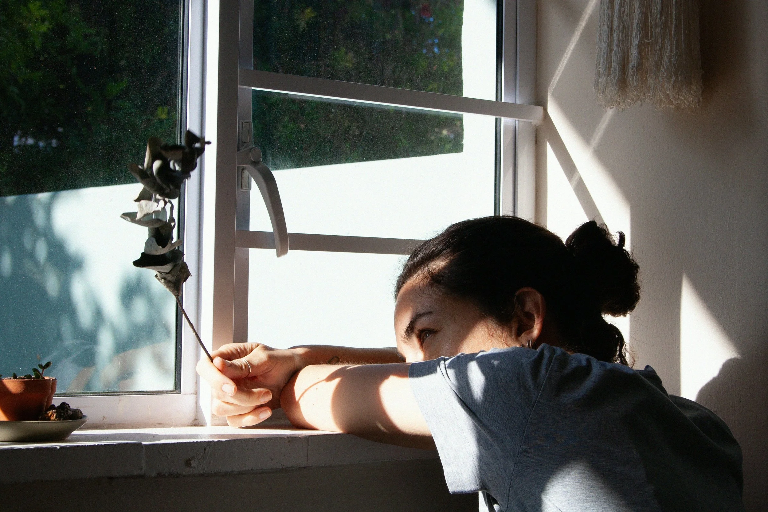 Woman feeling disconnected from herself while balancing career, partnership, and motherhood