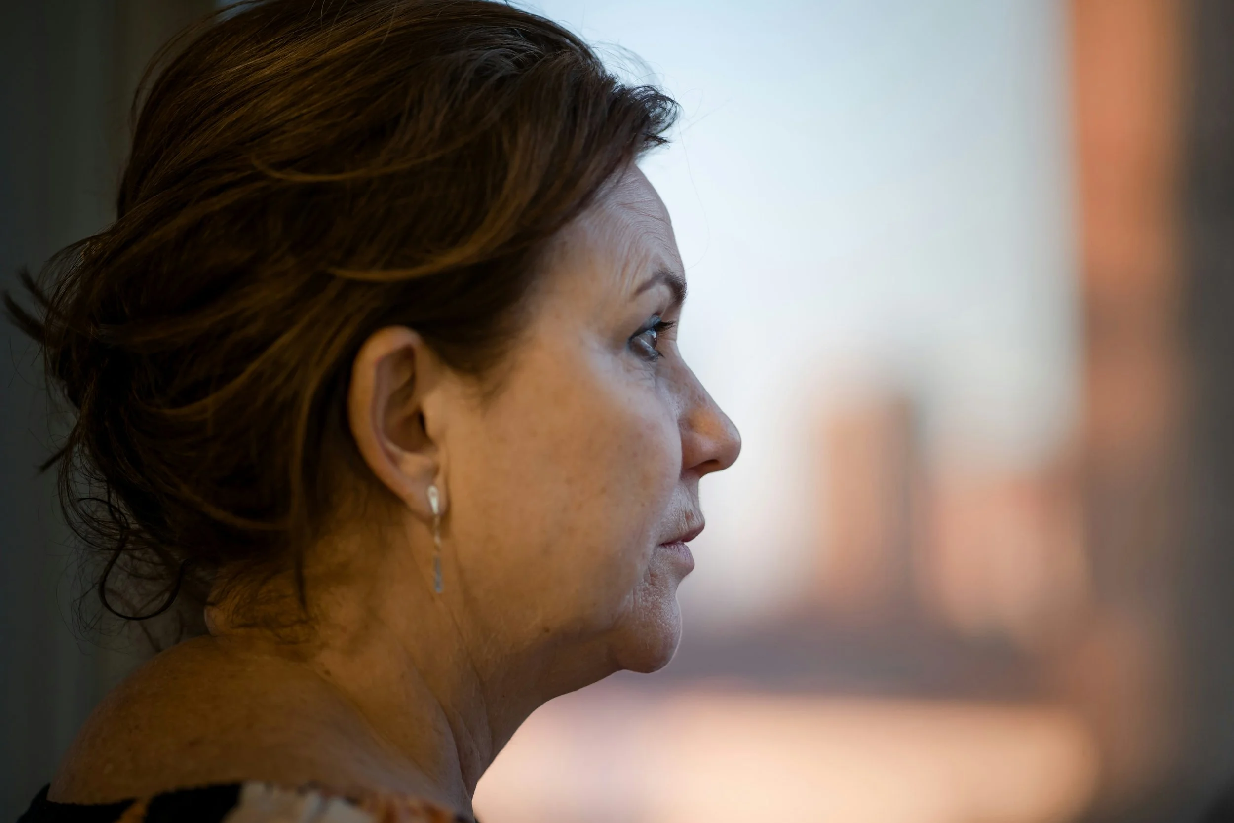 Woman in the empty nest phase reflecting on identity beyond her former roles