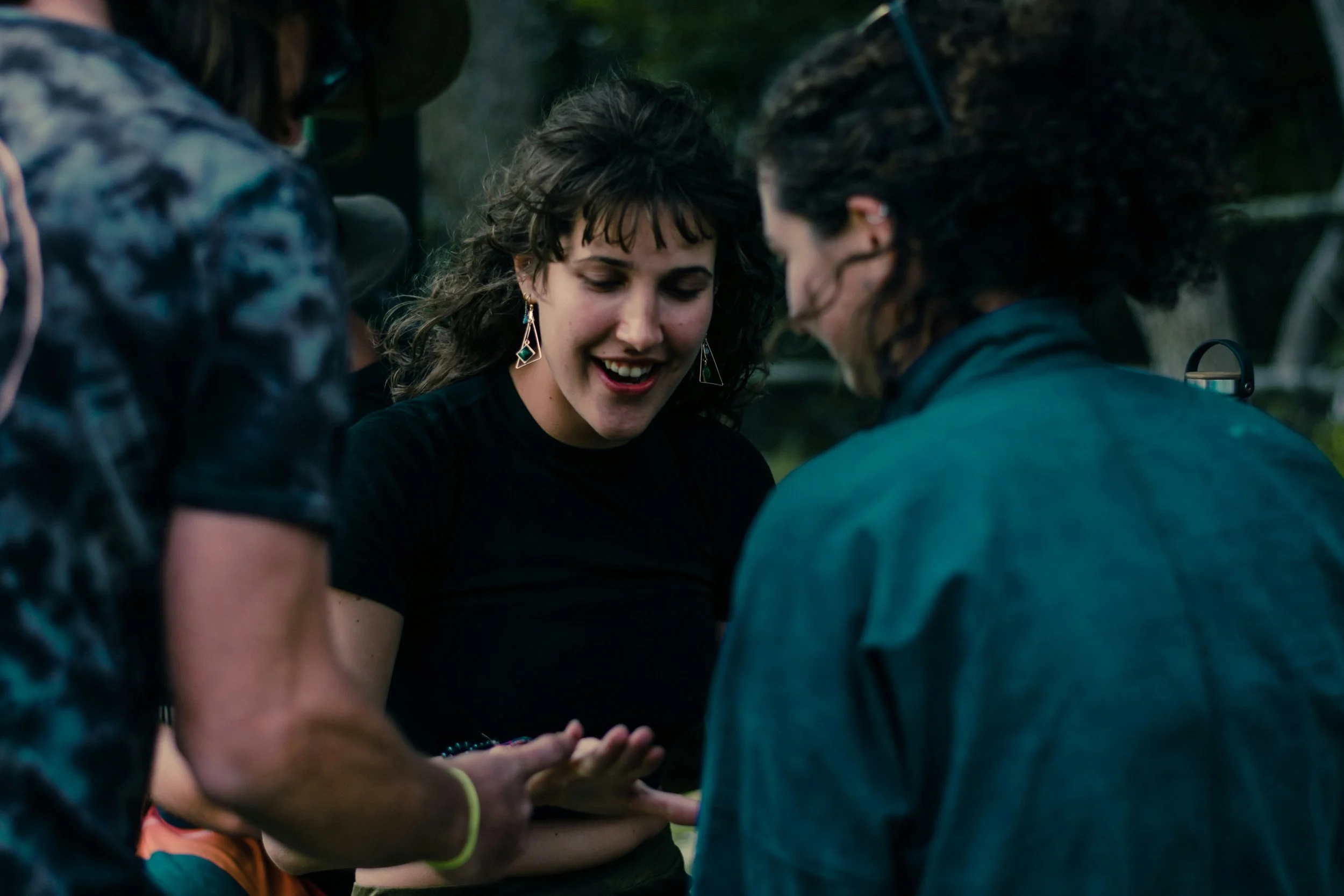 Woman appearing agreeable in a social setting while masking her own needs