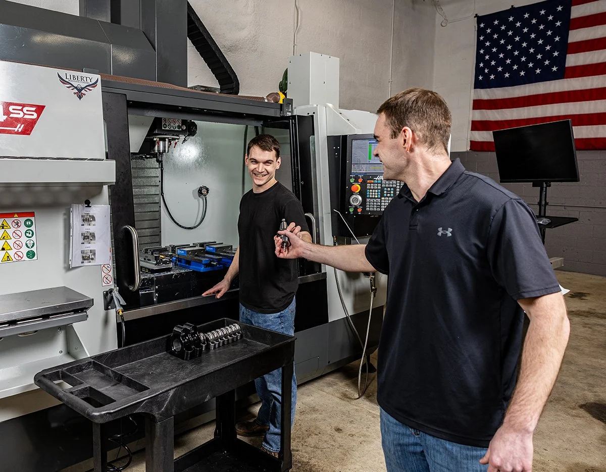 Liberty-Manufacturing near-Philadelphia-owners-working-on-shop-floor