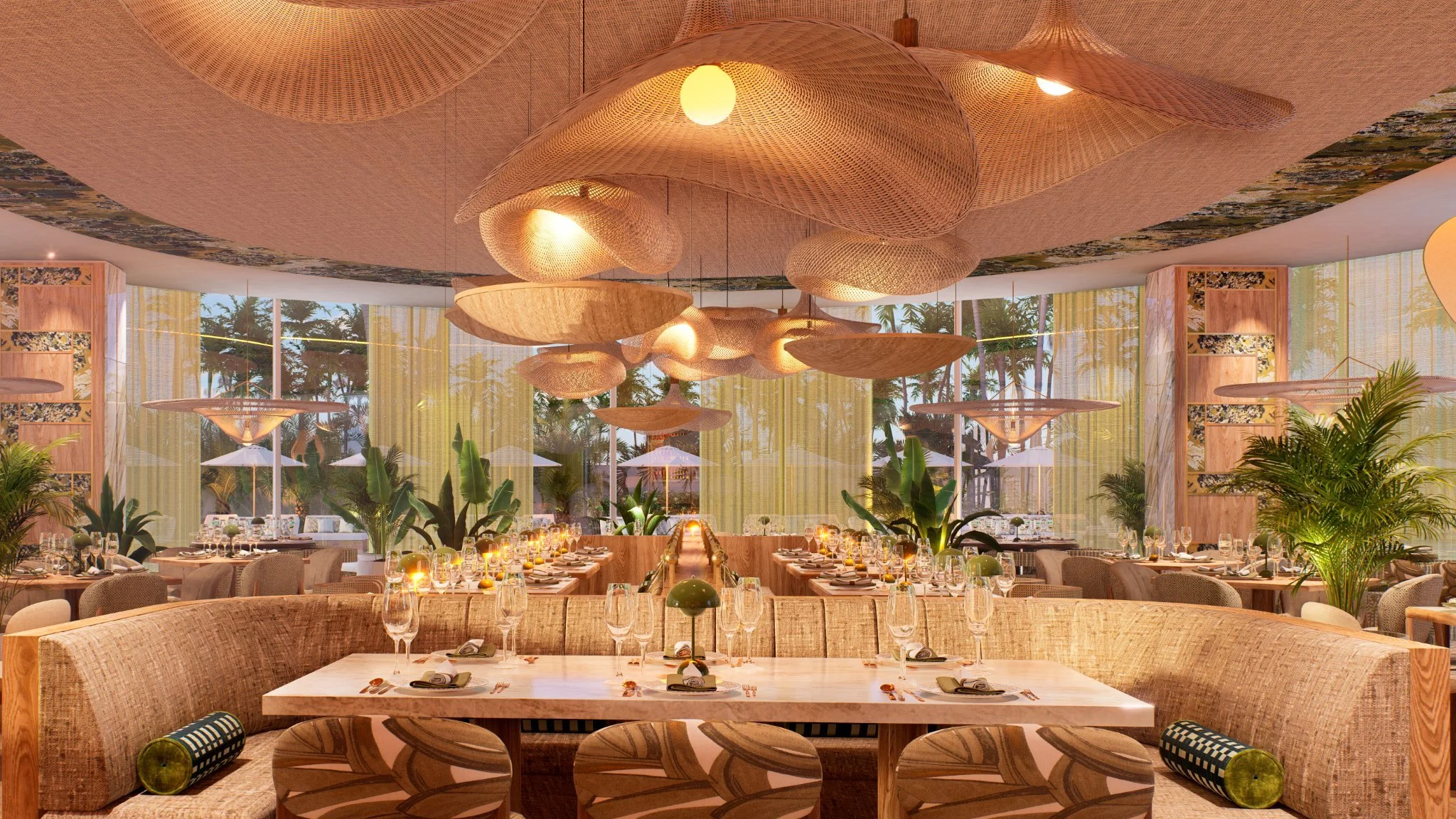 Elegant restaurant interior with tropical decor, featuring wooden furniture, lush green plants, large windows, and artistic ceiling fixtures.