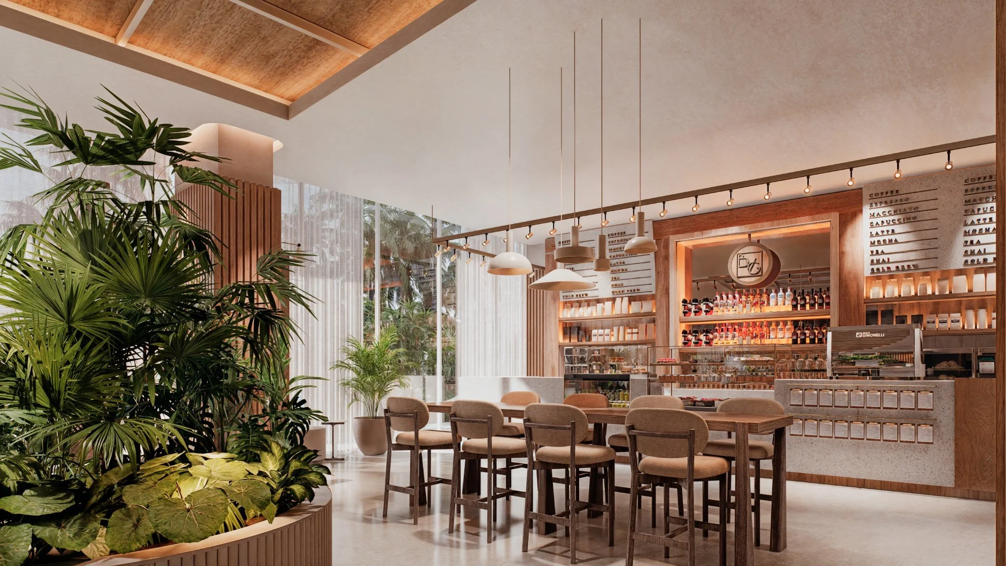 Modern coffee shop interior with seating area, bamboo decor, and large windows, featuring green plants and a counter displaying bottled beverages.