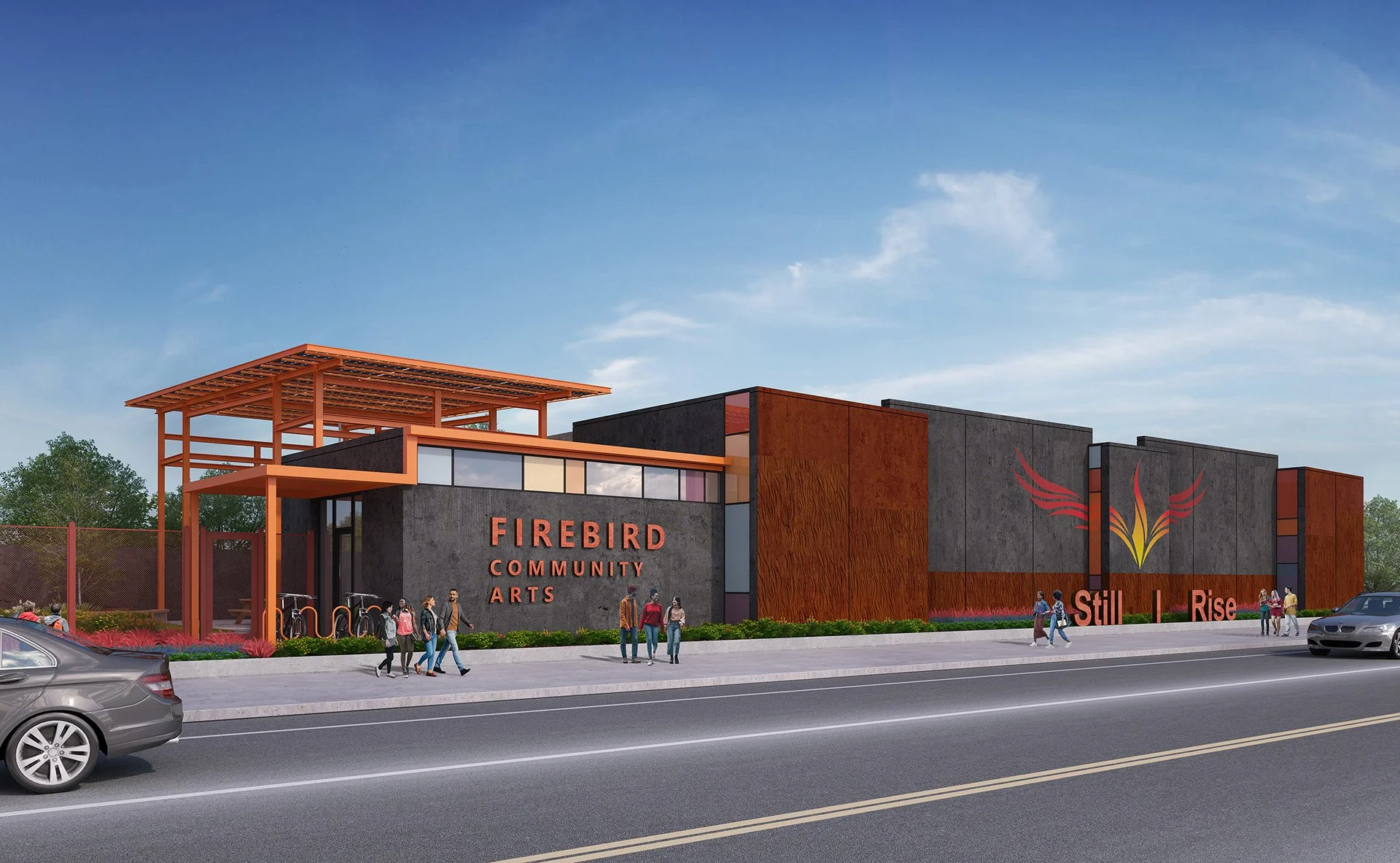 Rendering of a modern community arts center named Firebird Community Arts featuring contemporary architecture with orange and gray exterior walls, a unique logo resembling a stylized firebird, and the words "Still I Rise" on the front, with people walking on the sidewalk and cars on the street.