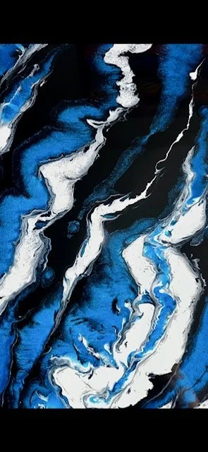 Custom blue, white, and black metallic epoxy floor with dramatic marble and geode-effect veining by Tru Epoxy Nation.