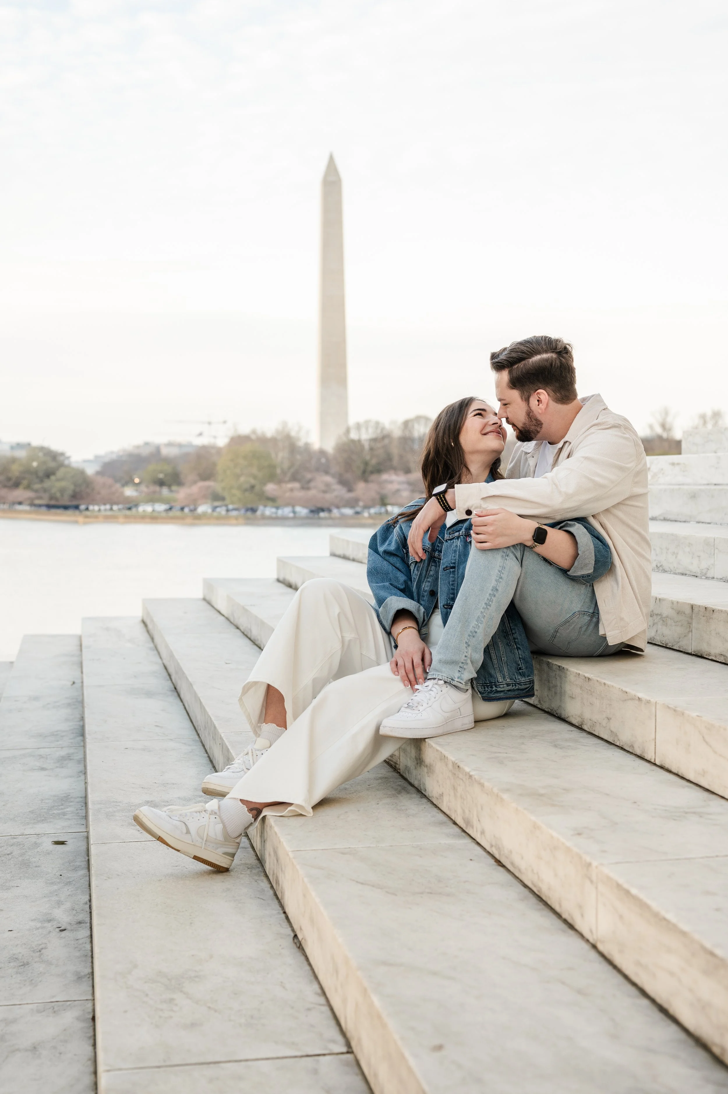 couple-sitting-steps-jefferson-memorial-washington-monument.JPG