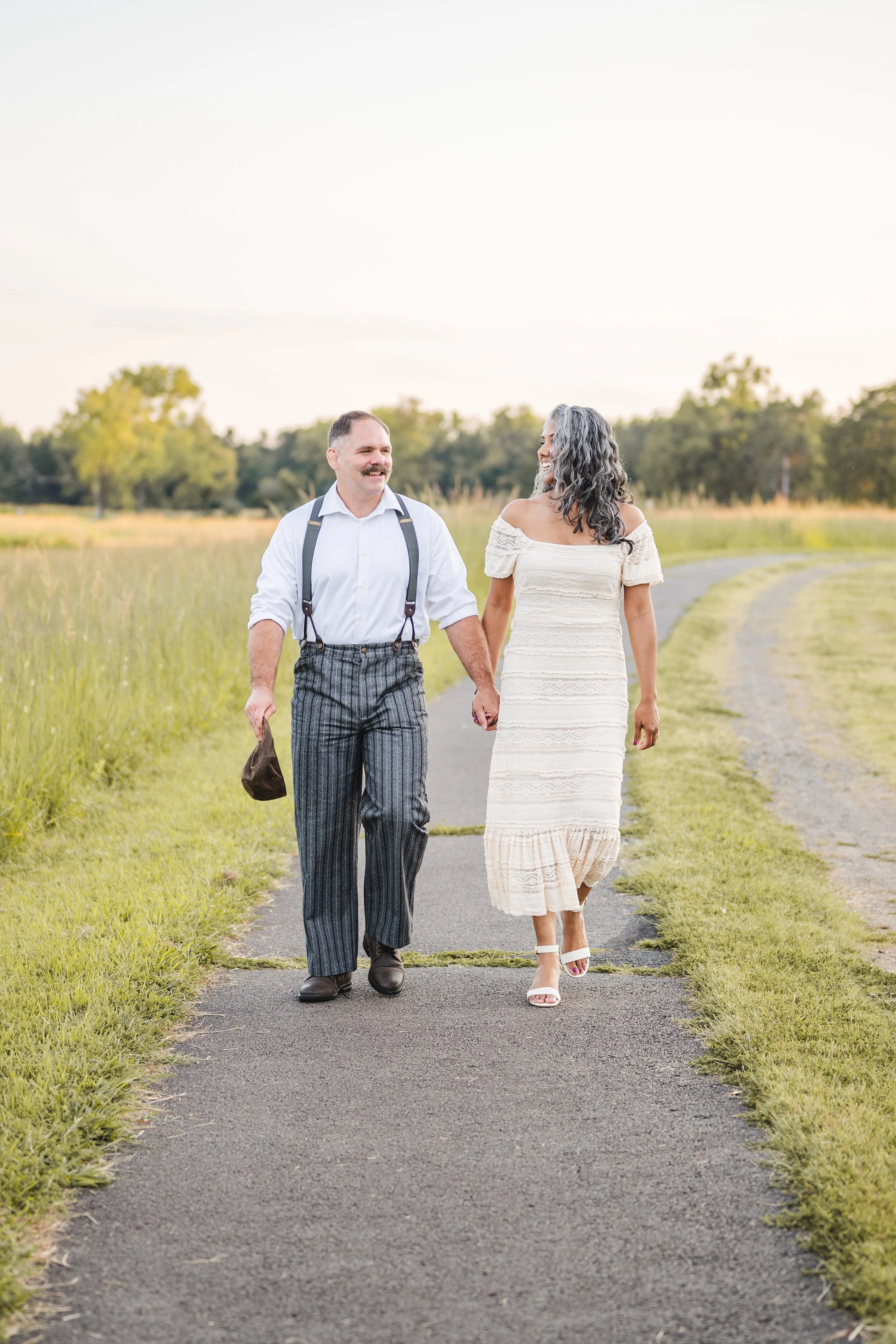 couple-walking-manassas-battlefield-engaged-va.JPG