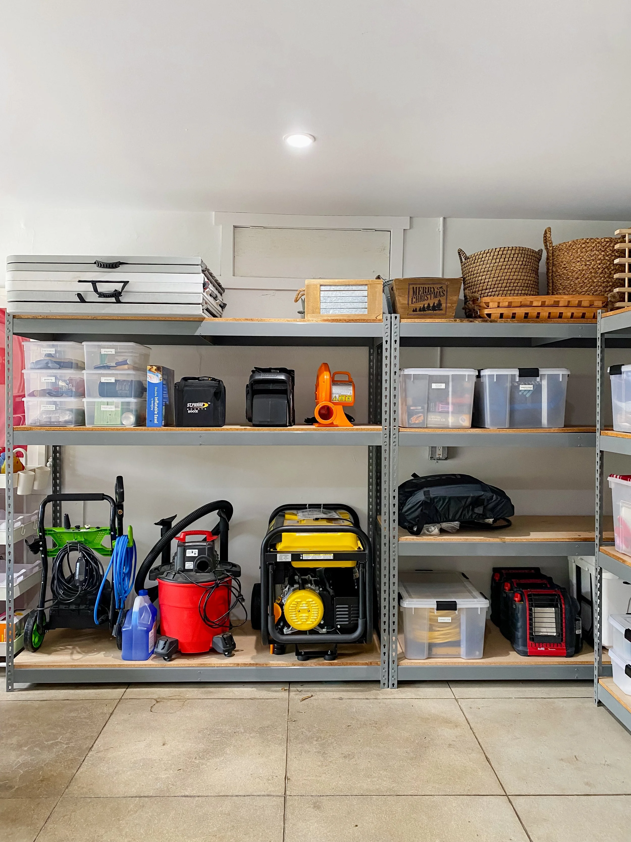organized garage with labeled bins