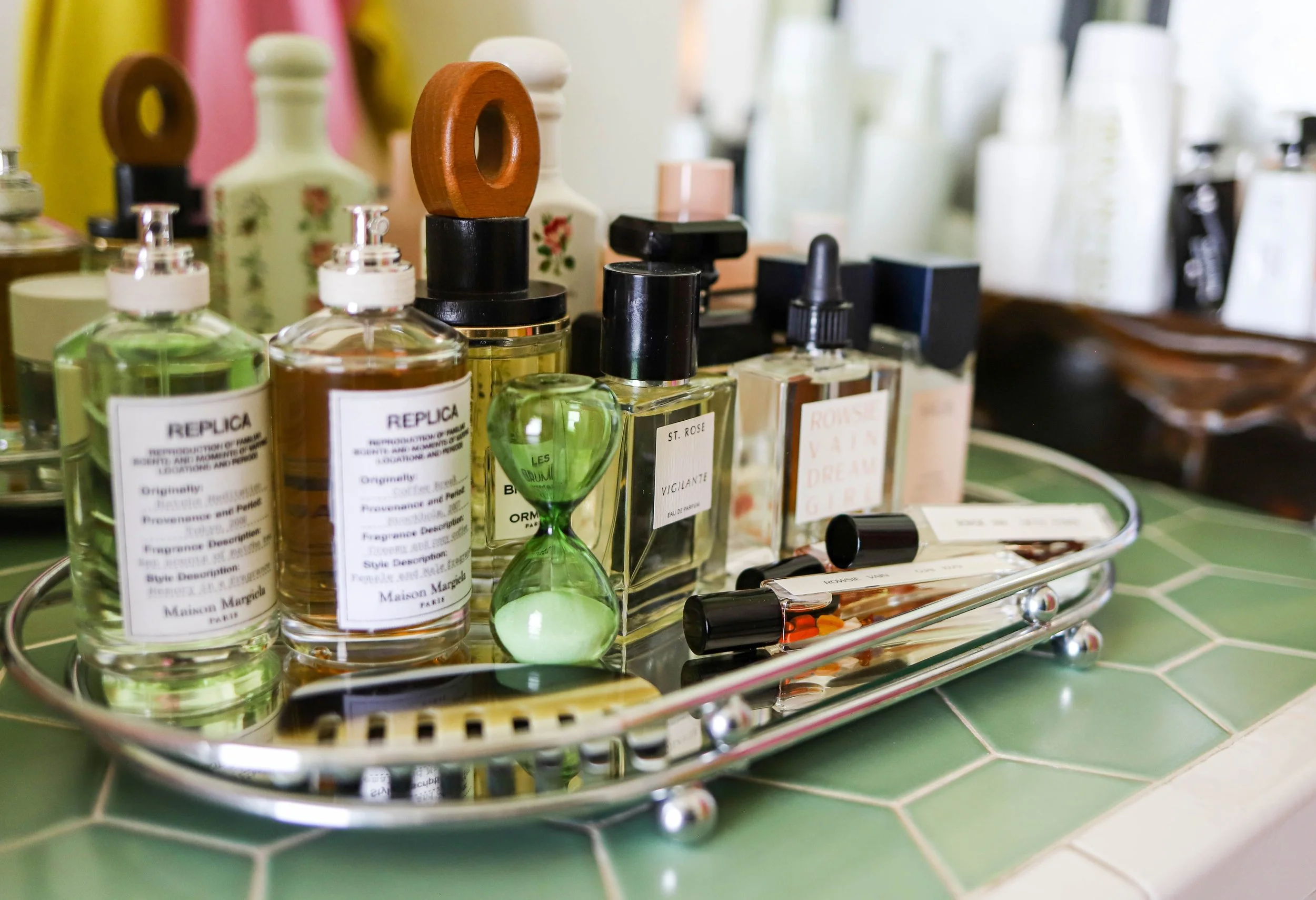 organized perfume on a tray
