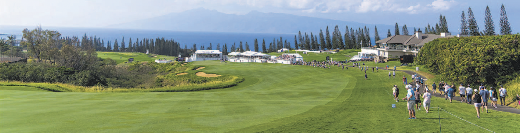 People walking on Kapalua Golf Course in Maui, where lawsuits allege mismanagement of West Maui’s water supply.