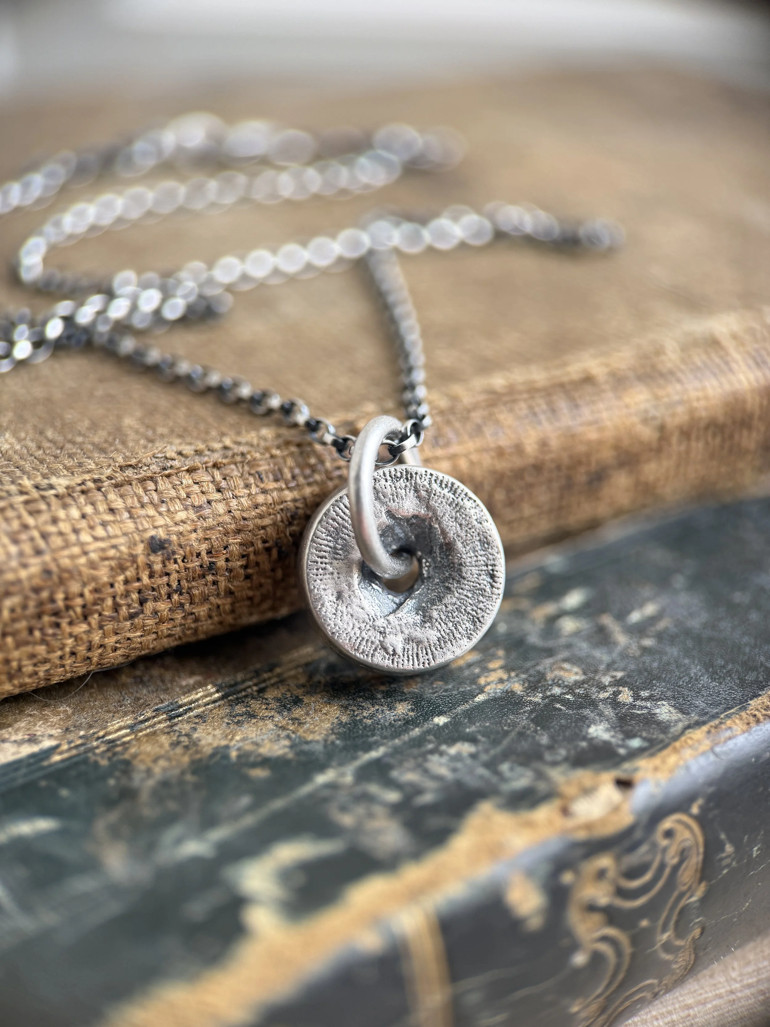 Crinoid Fossil necklace in Sterling Silver