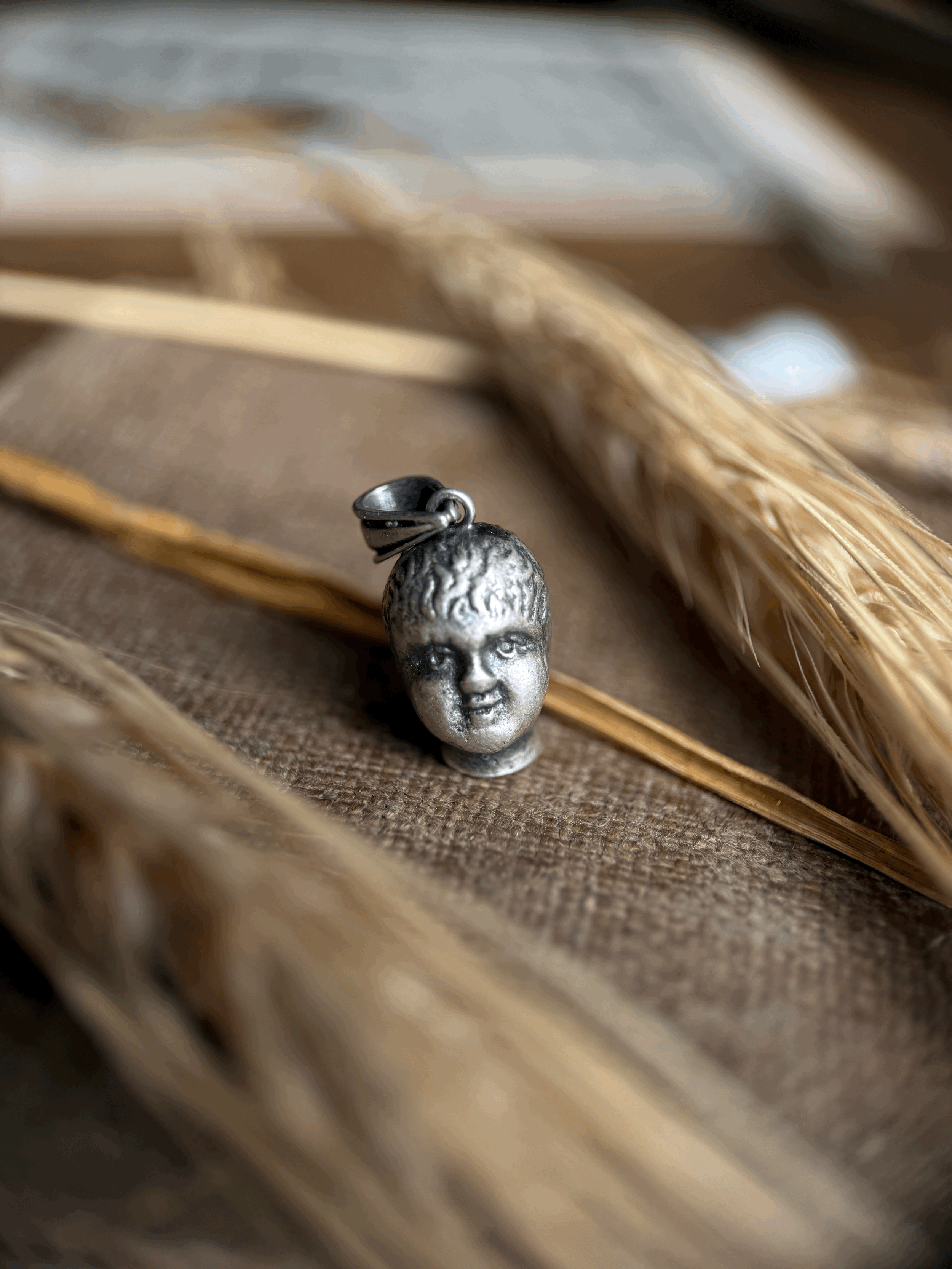 Found Doll Head necklace in Sterling Silver