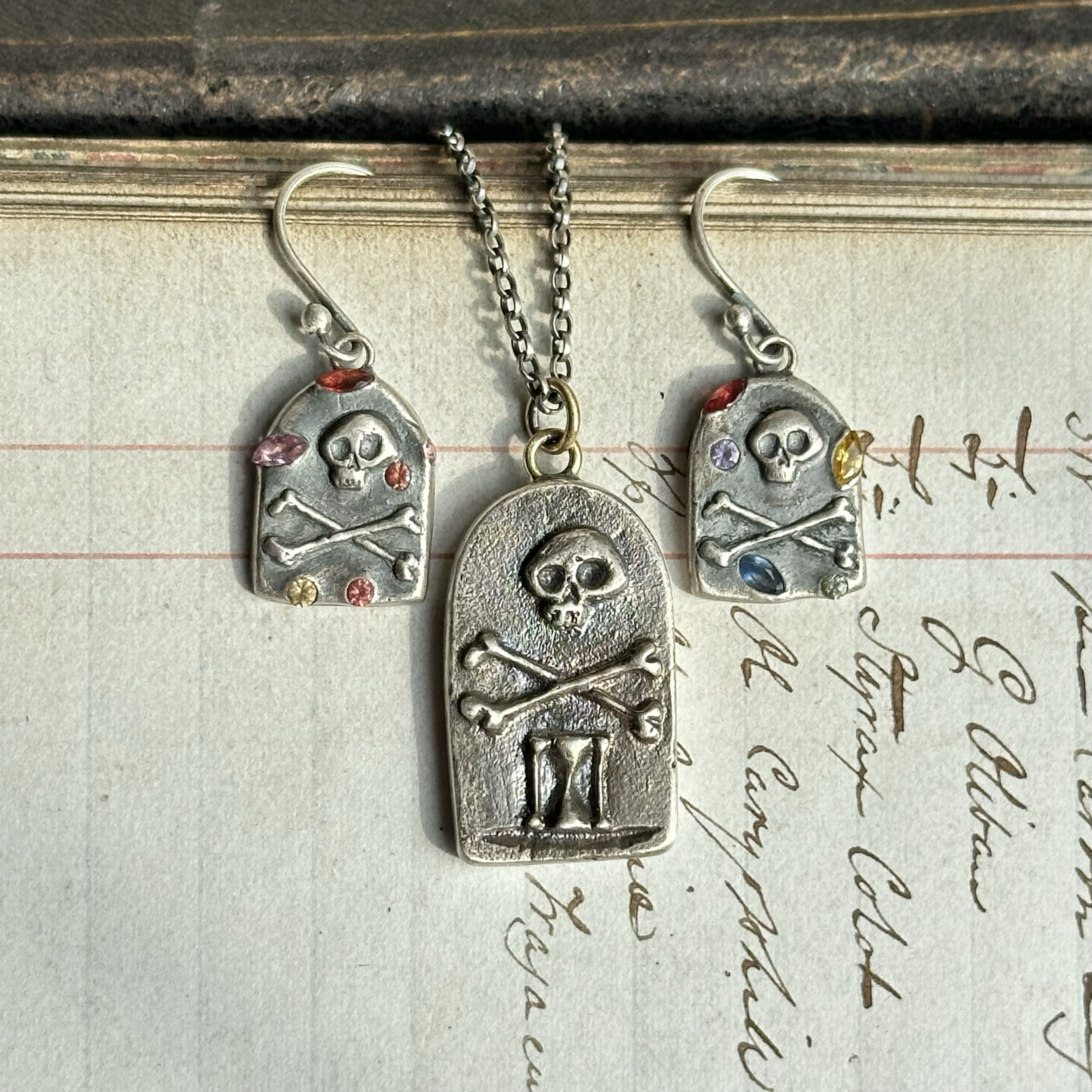 Sapphire set memento mori headstone necklace and earring set 2022.
