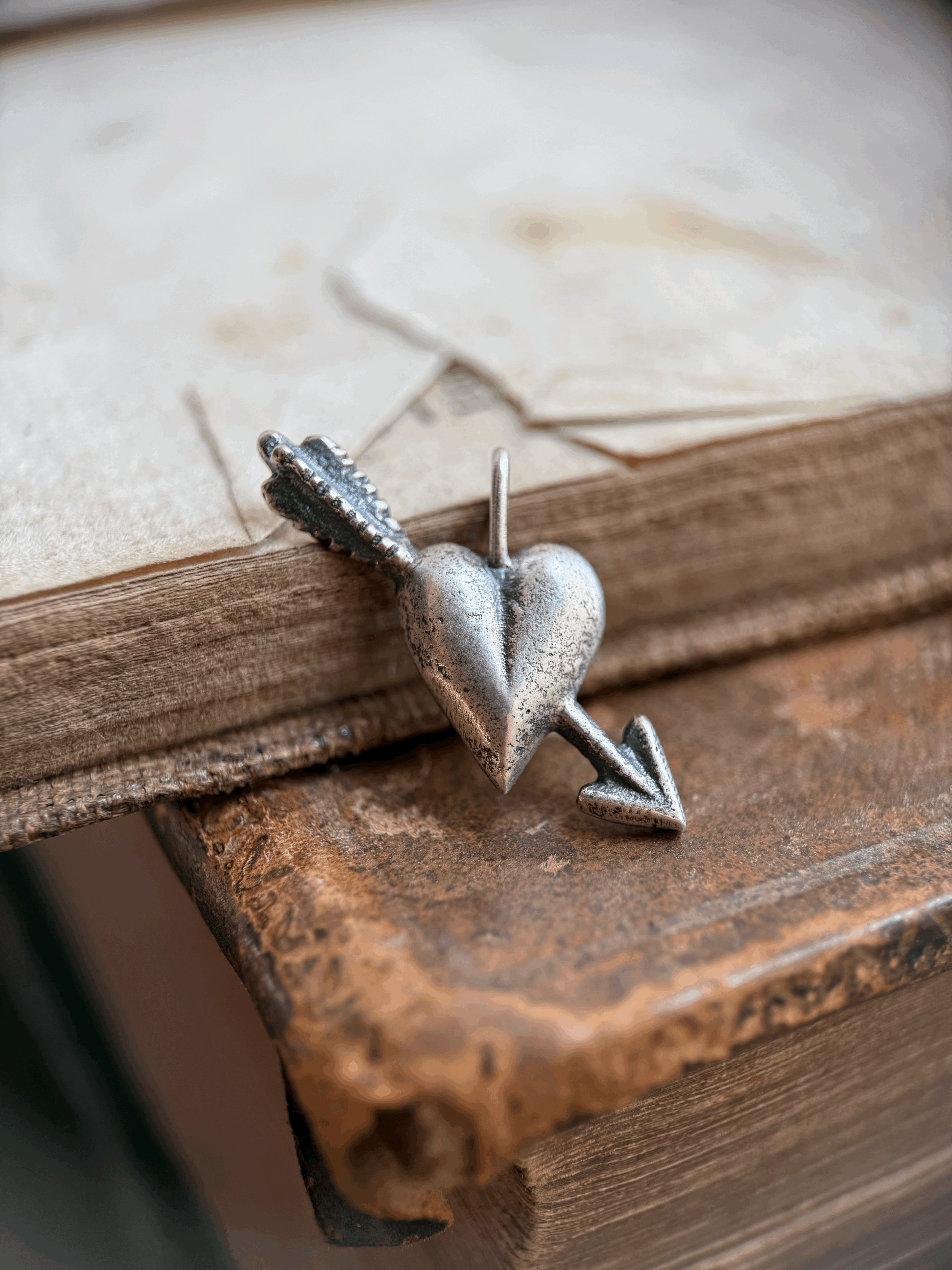 Small Heart and Arrow pendant in Sterling Silver