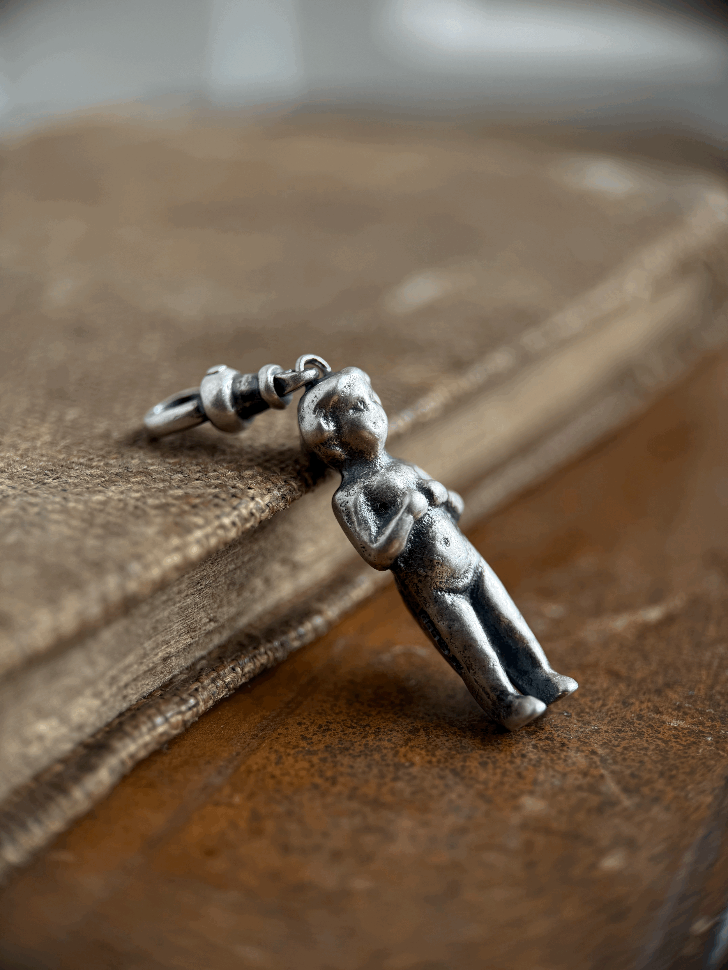 Puddling Doll Charm in Sterling Silver