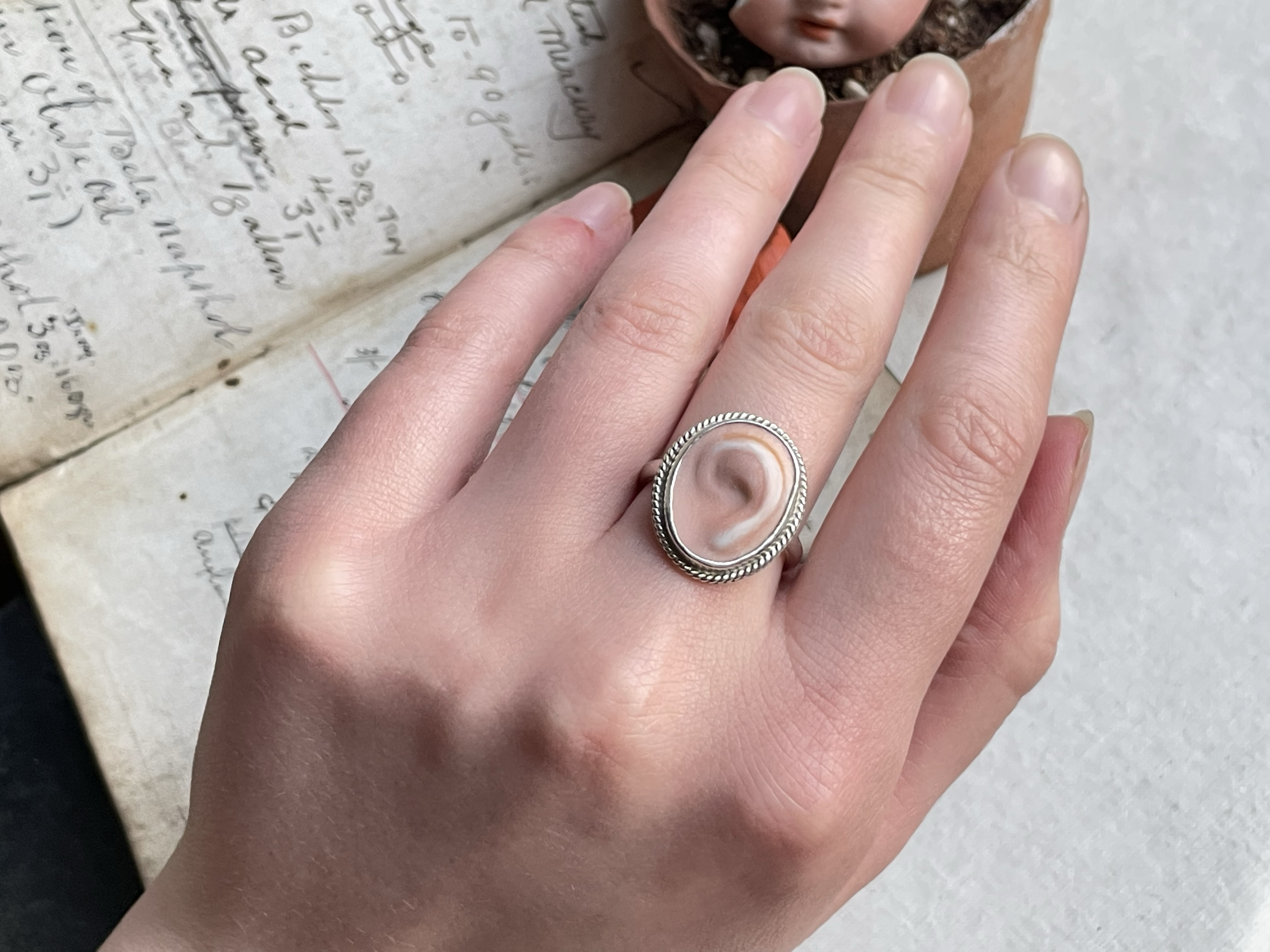 'Ear Ring'. A silver ring made with a found Victorian/Edwardian porcelain dolls ear 2021