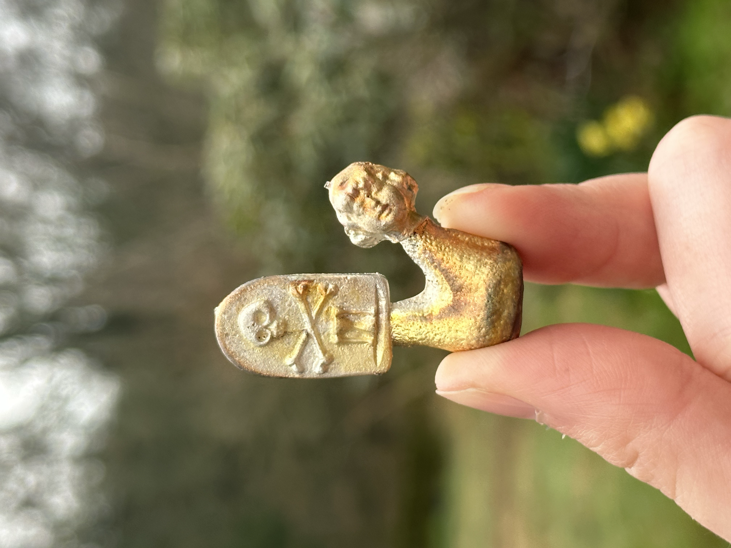 Sand cast items attached to sprue. 