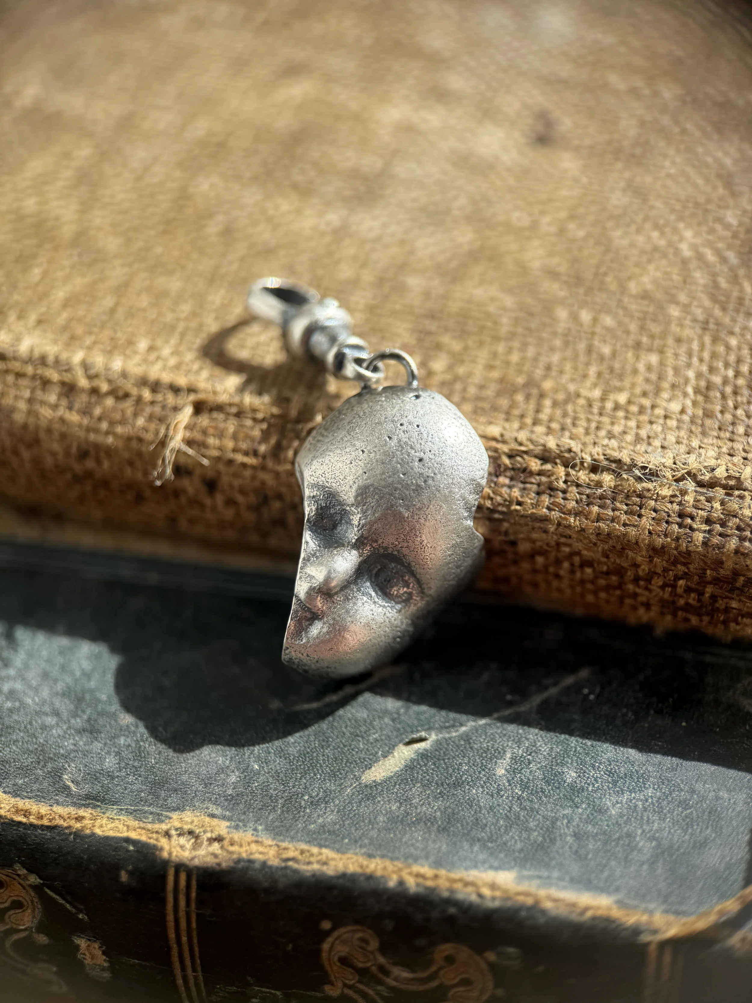 Doll Face Sherd Charm in Sterling Silver