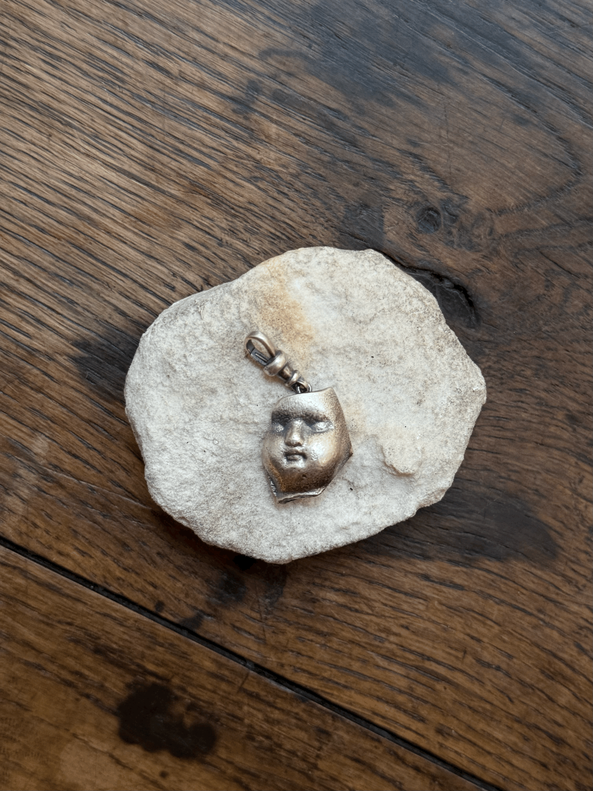Found doll Face Sherd Charm in Sterling Silver