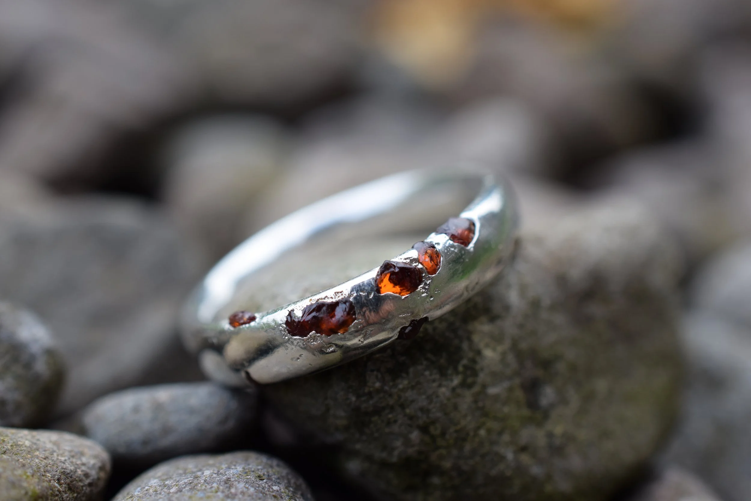 Silver ring cast with garnets found on a beach in Scotland. 
