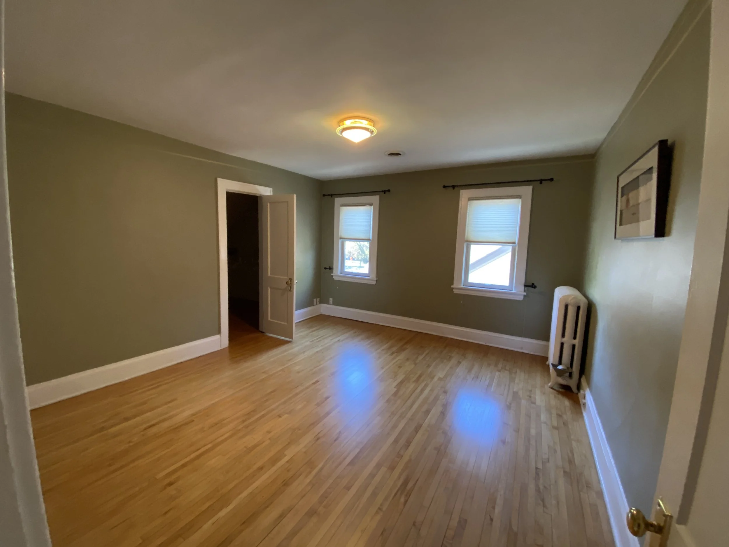 BEFORE: vacant primary bedroom in Minneapolis, MN