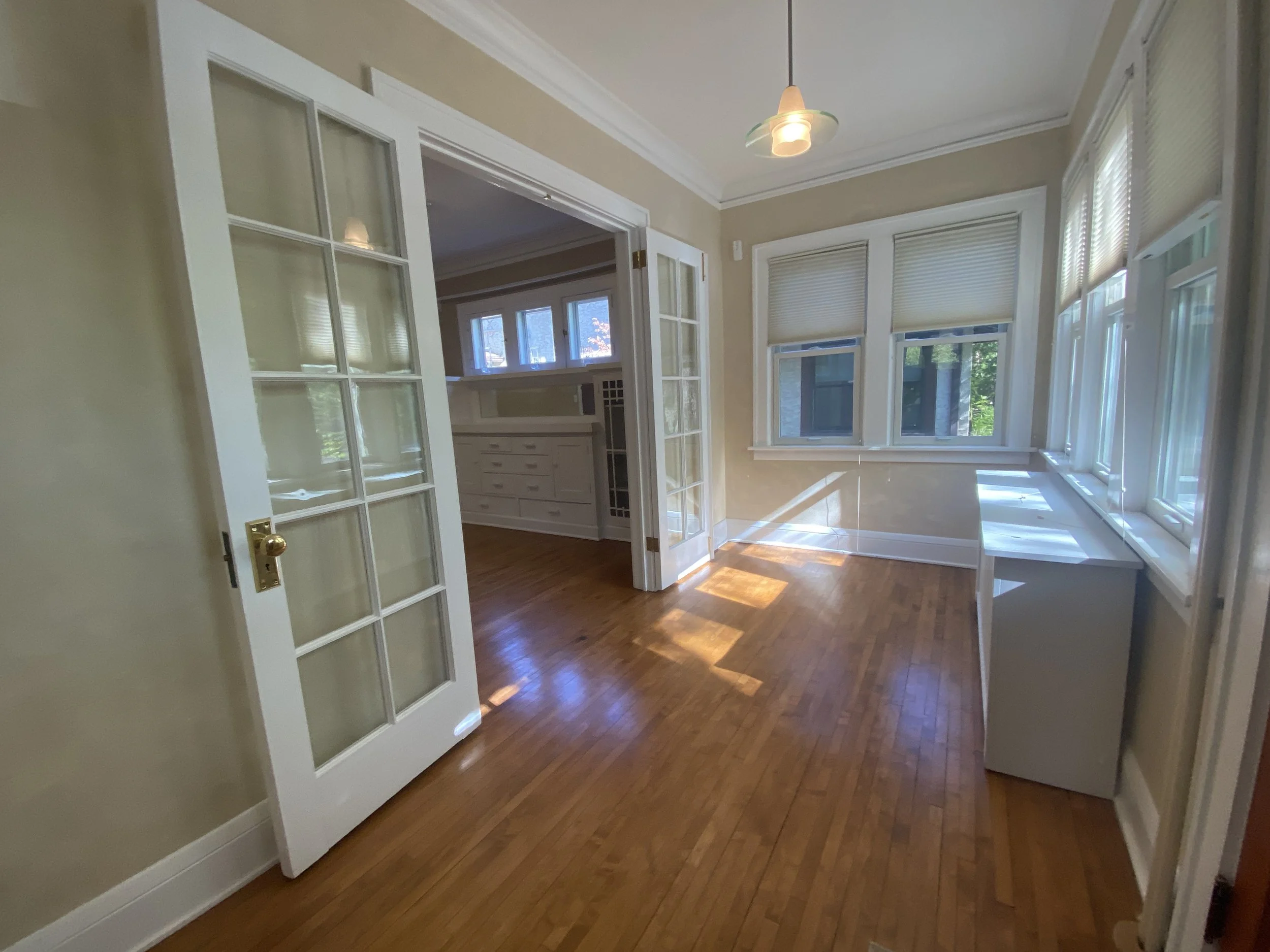 BEFORE: vacant entry sunroom in Minneapolis, MN