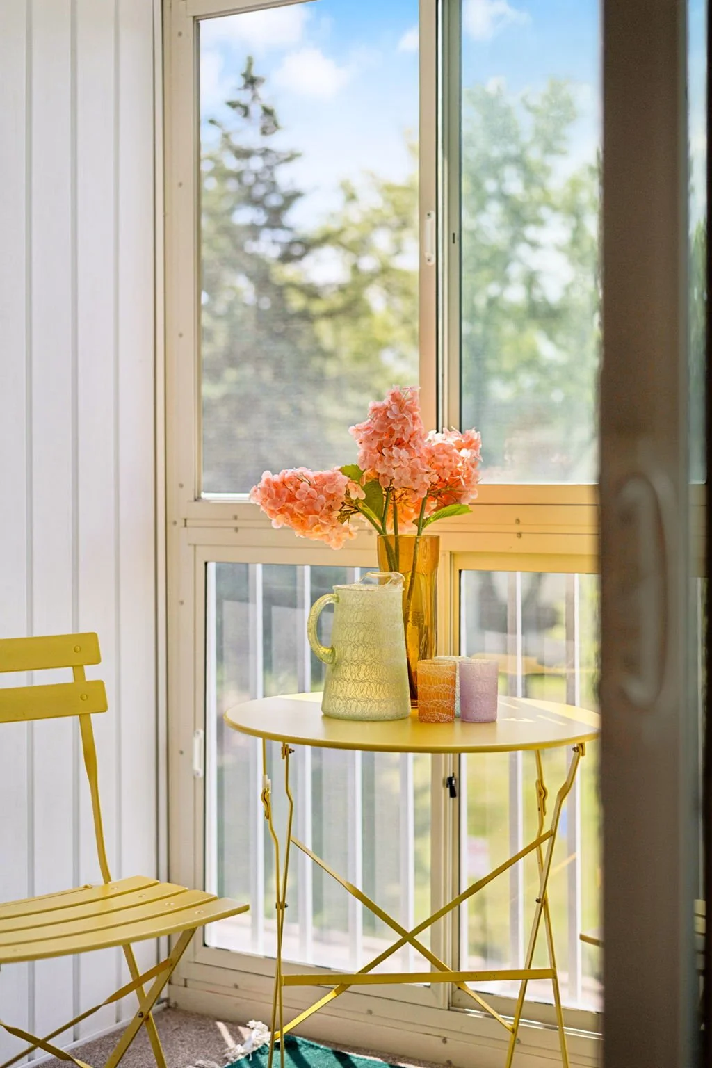 Staged porch in a sunny condo in Little Canada, MN