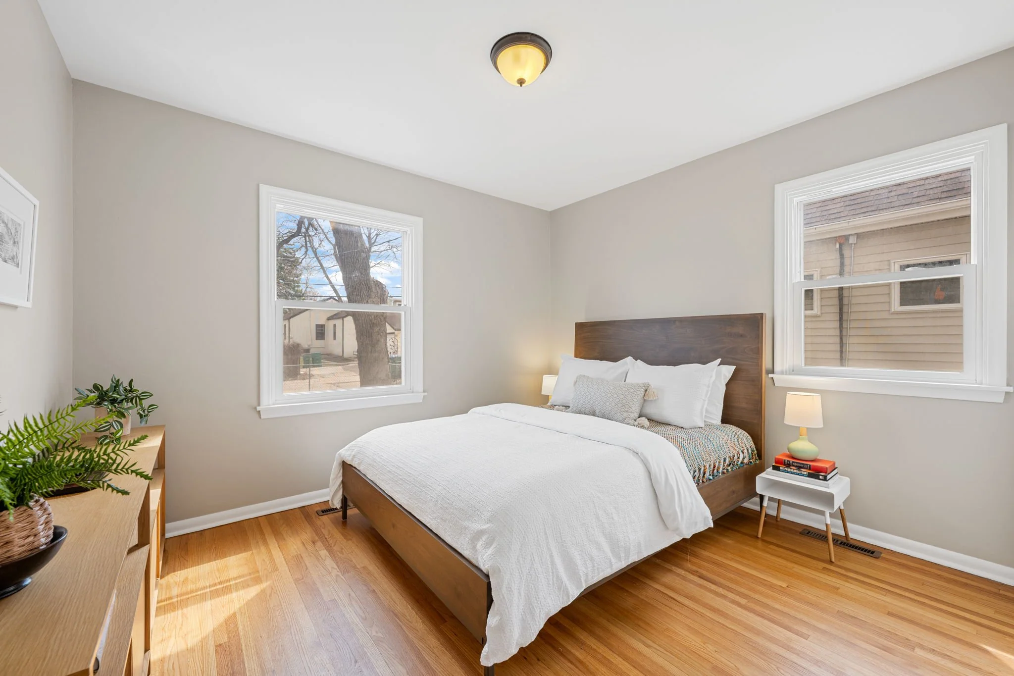 AFTER: fully staged bedroom in Saint Louis Park, MN