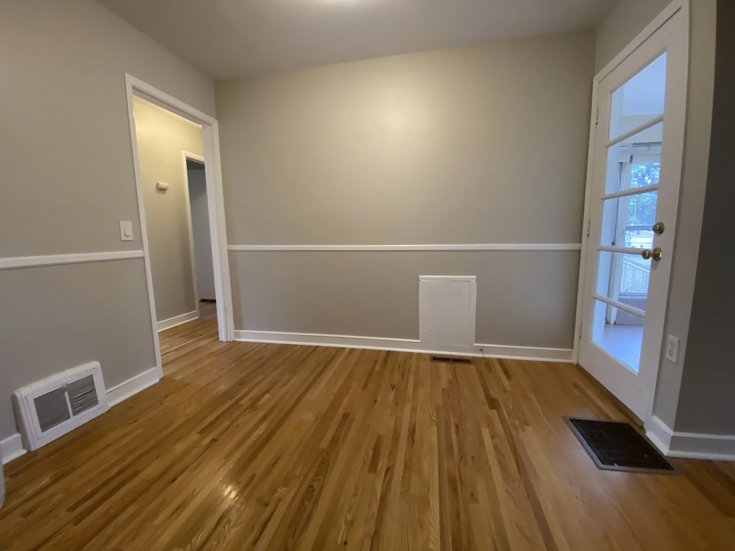 BEFORE: vacant dining room in Saint Louis Park, MN