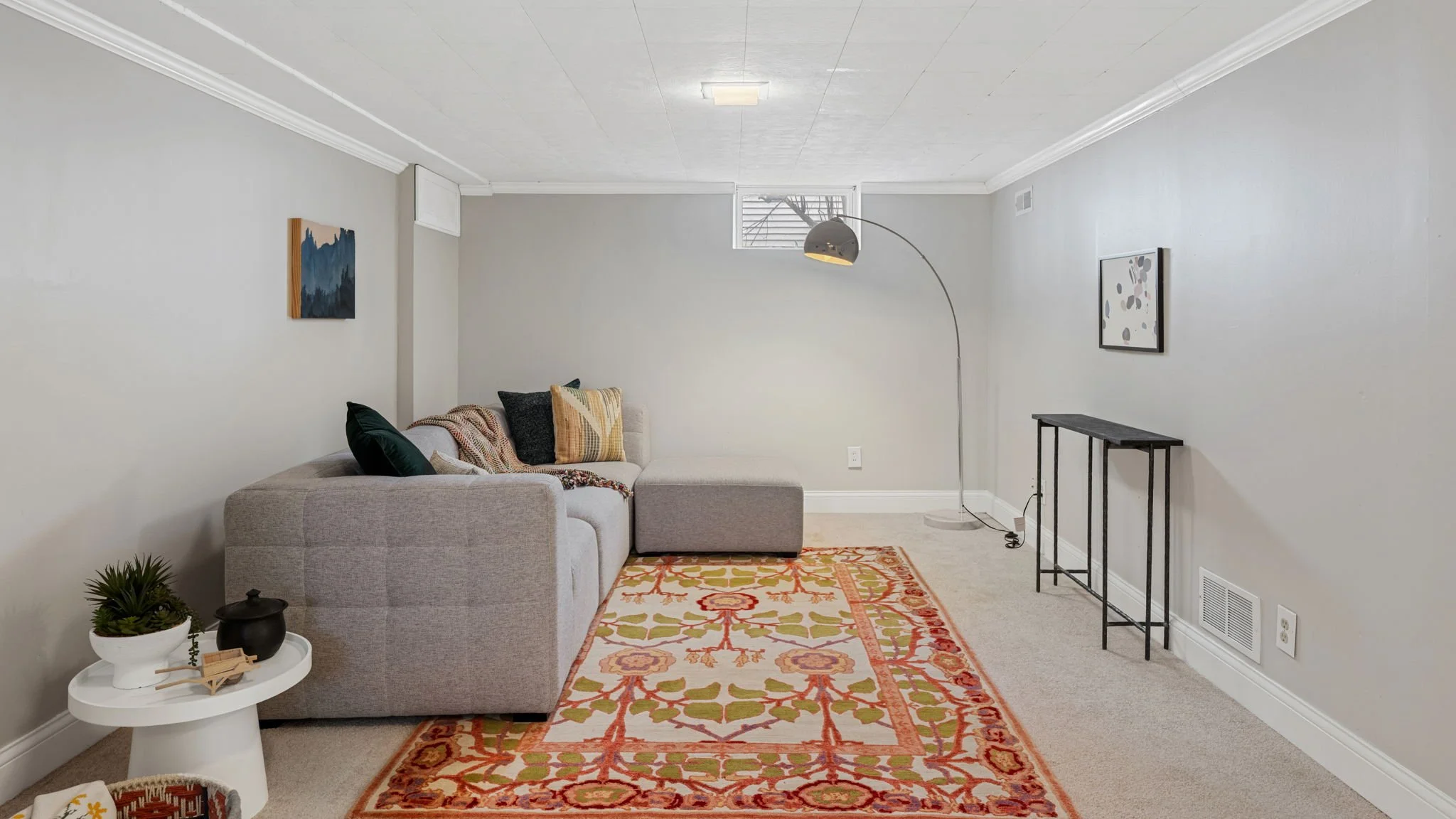 AFTER: fully staged lower level family room in Saint Louis Park, MN