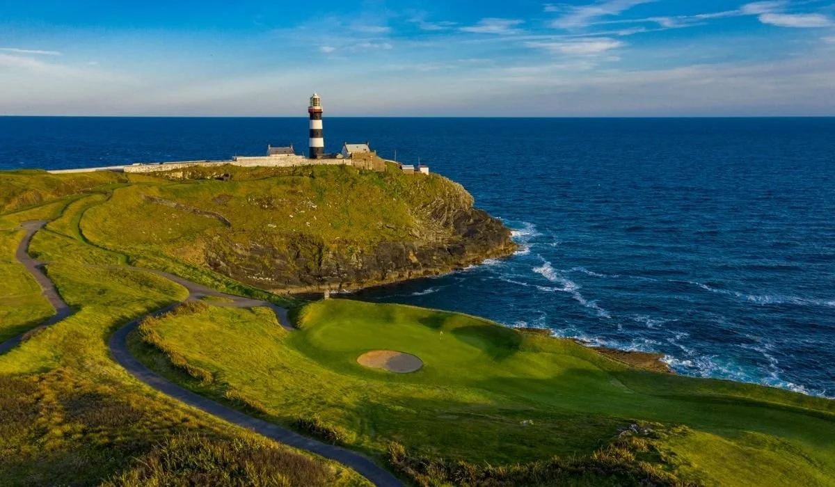 The famous Ballybunion Golf Club links course overlooking the Atlantic with the historic Ballybunion lighthouse nearby.