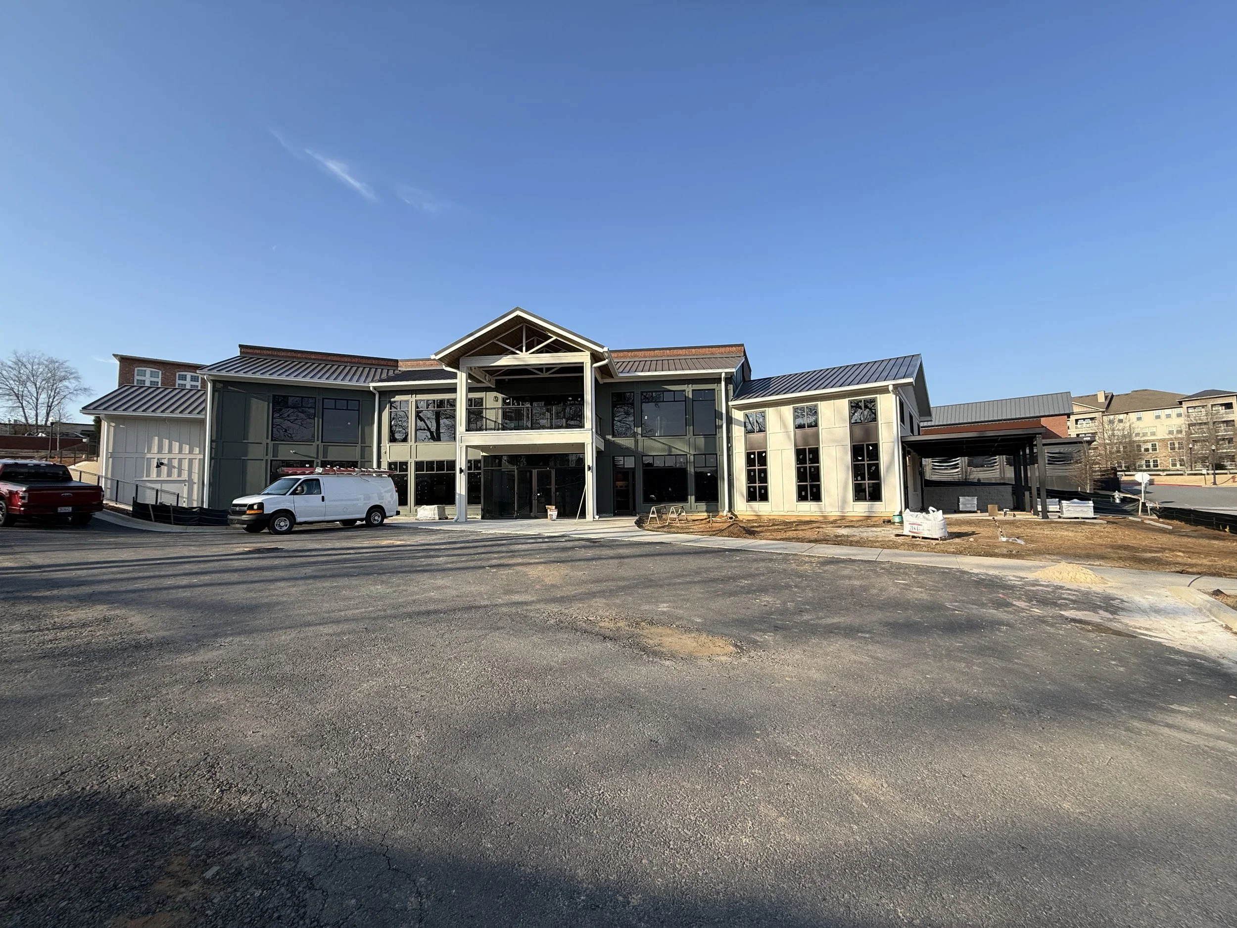Oranssi technician working on a roof project