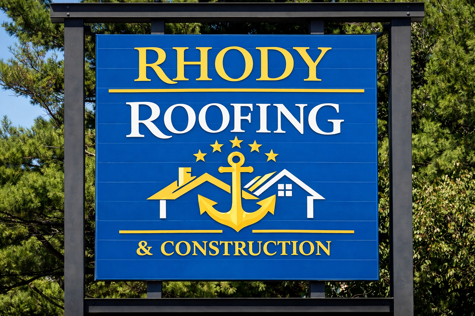 Blue sign for Rhody Roofing & Construction with yellow text, a yellow anchor, and house symbols, set against a background of green trees.