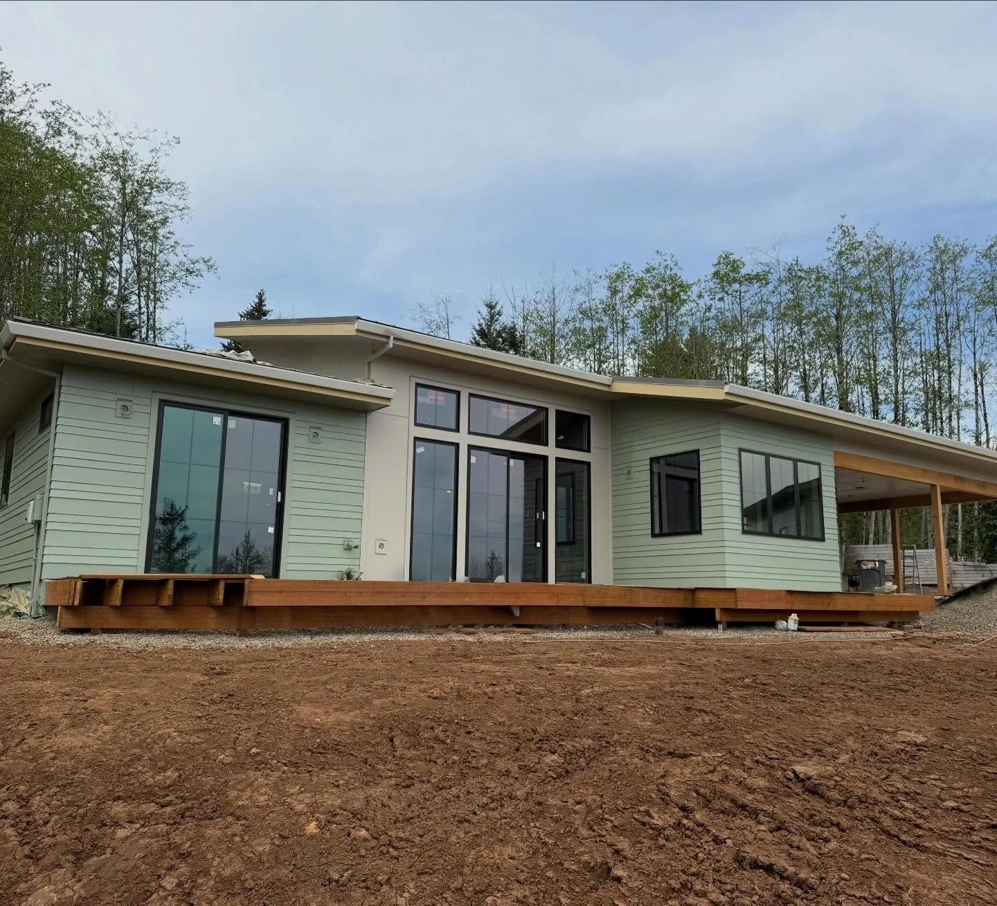 Coming around the corner on this hillside build! This home sits into a small bench we cut into the slope of this Camas view lot. 

We have a deck, trims and a natural northwest landscape plan to get through before we can do final photos of this one o
