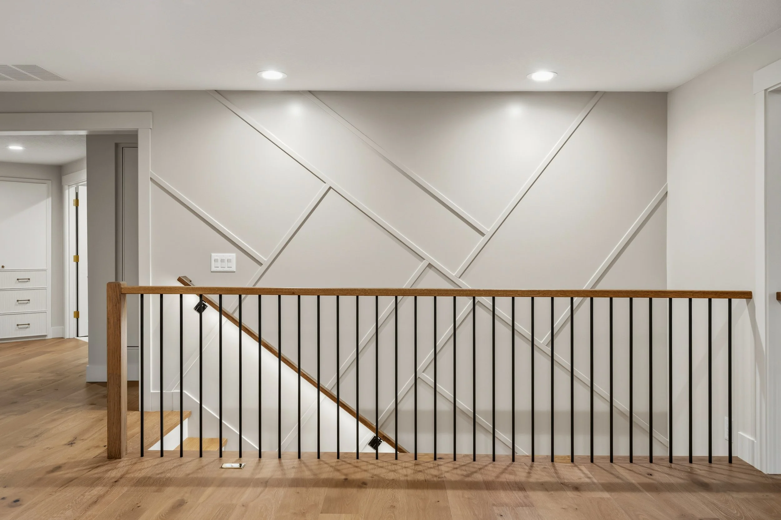 evergreen-highway-renovation-vancouver-wa-03-staircase-accent-wall.jpg