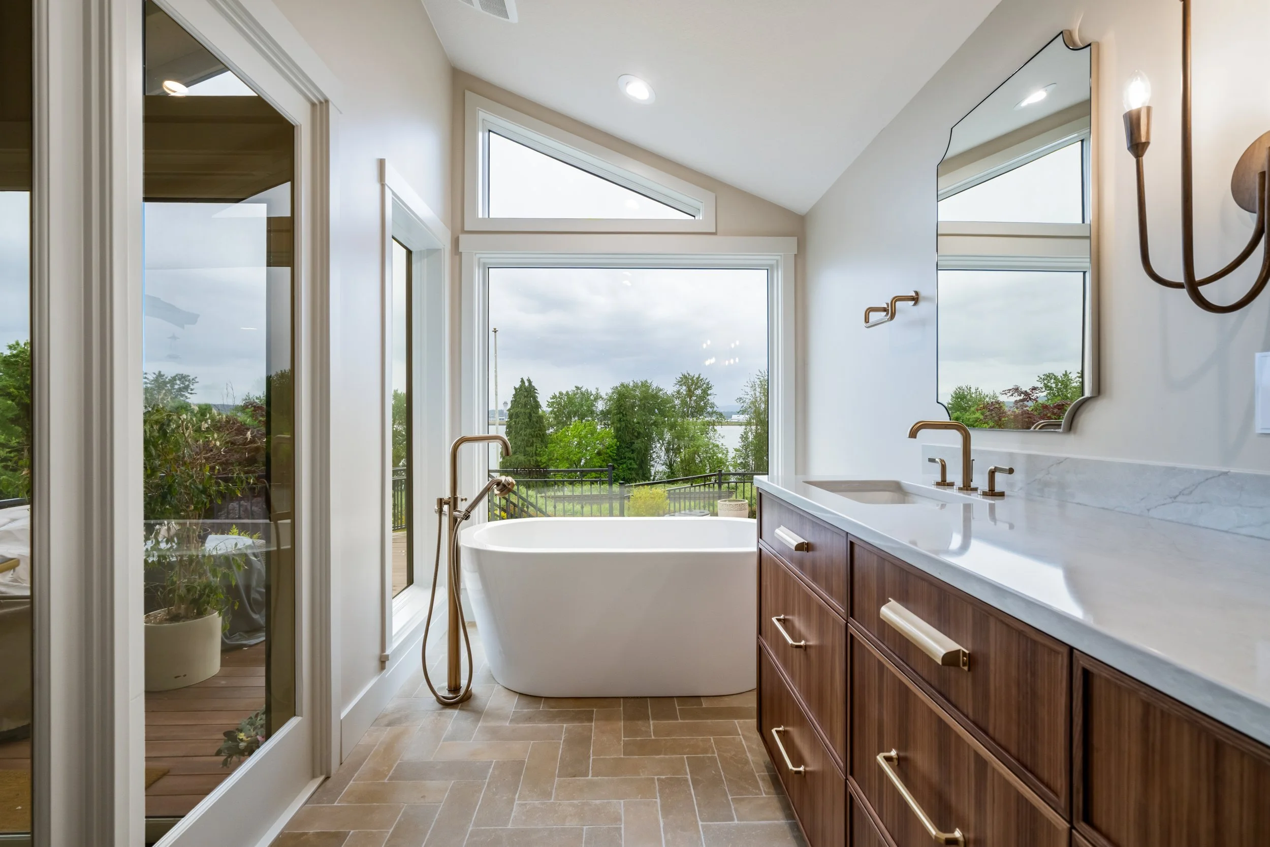 evergreen-highway-renovation-vancouver-wa-02-primary-bath-soaking-tub-river-view.jpg